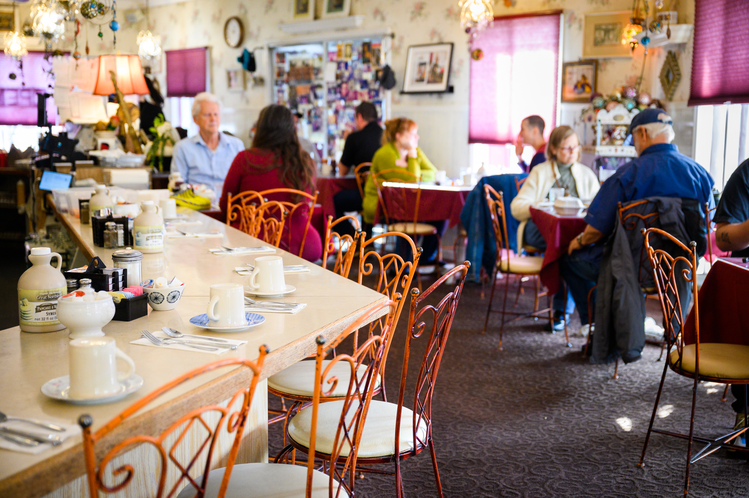 Customers sit and eat within the dining room at Cameo Cafe in Portland, Oregon.