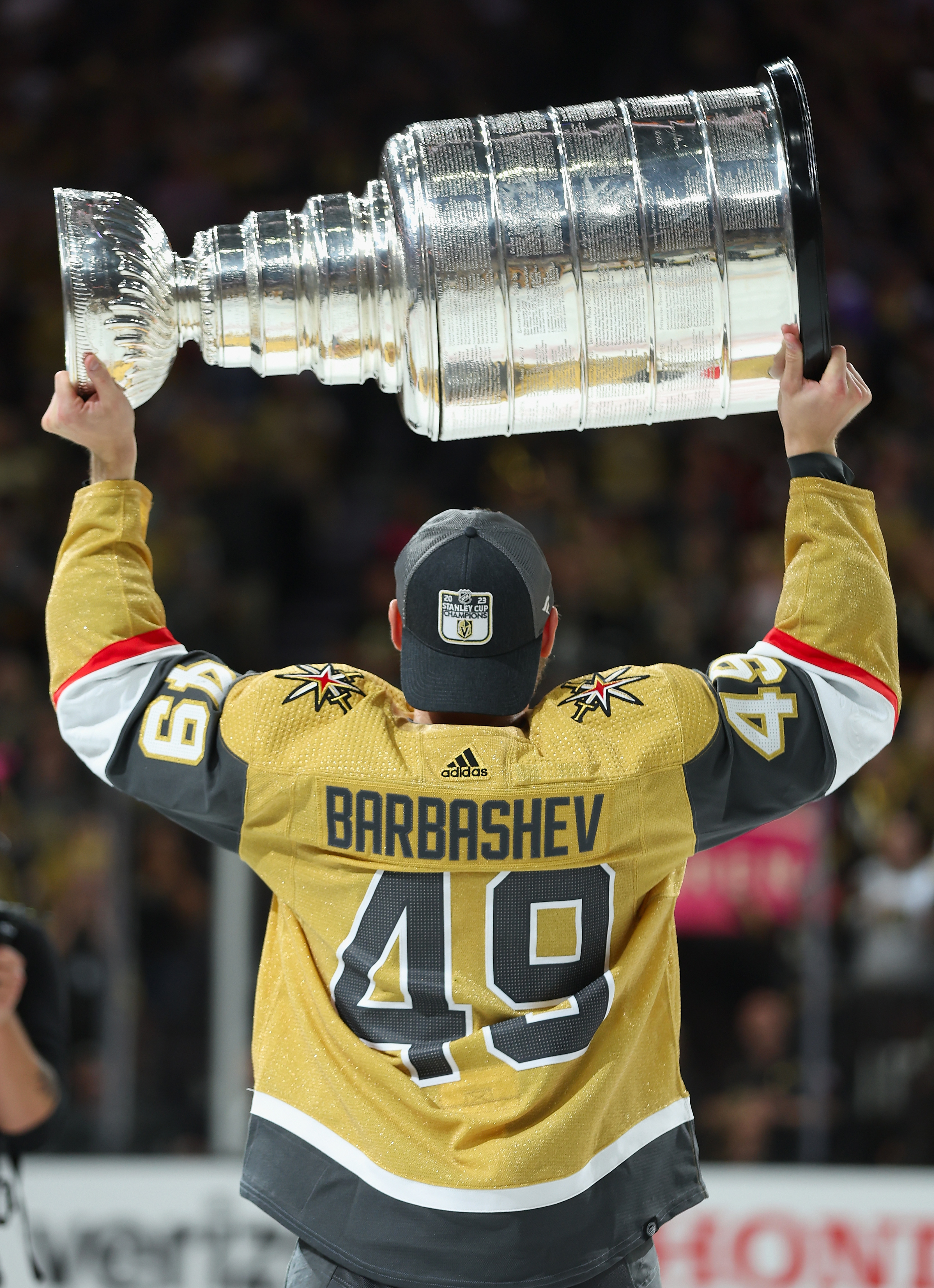 Ivan Barbashev #49 of the Vegas Golden Knights hoists the Stanley Cup following their victory over the Florida Panthers in Game Five of the 2023 NHL Stanley Cup Final at T-Mobile Arena on June 13, 2023 in Las Vegas, Nevada. The Golden Knights defeated the Panthers 9-3.