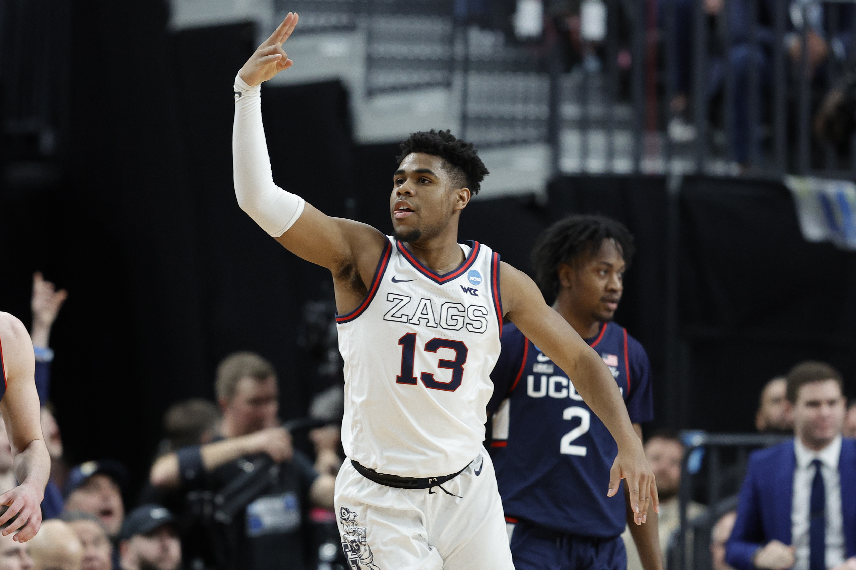 Malachi Smith #13 of the Gonzaga Bulldogs reacts after a made basket during the first half against the Connecticut Huskies in the Elite Eight round of the NCAA Men’s Basketball Tournament at T-Mobile Arena on March 25, 2023 in Las Vegas, Nevada.