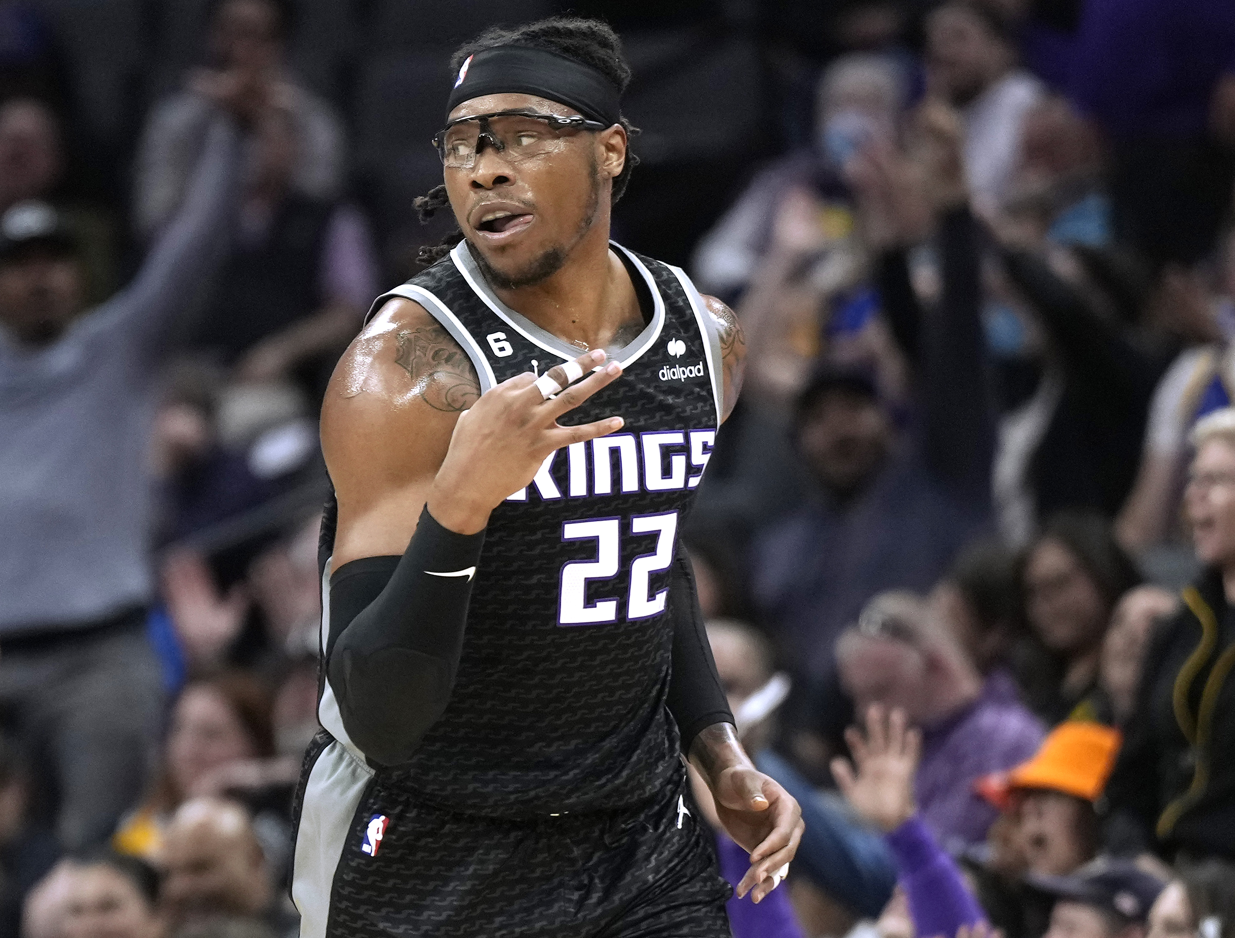 Richaun Holmes #22 of the Sacramento Kings running back up court reacts after making a three-point shot against the Golden State Warriors during the second quarter at Golden 1 Center on April 07, 2023 in Sacramento, California.&nbsp;