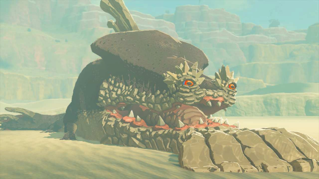 The Molduga shows its teeth while lying on the sand in Zelda: Tears of the Kingdom