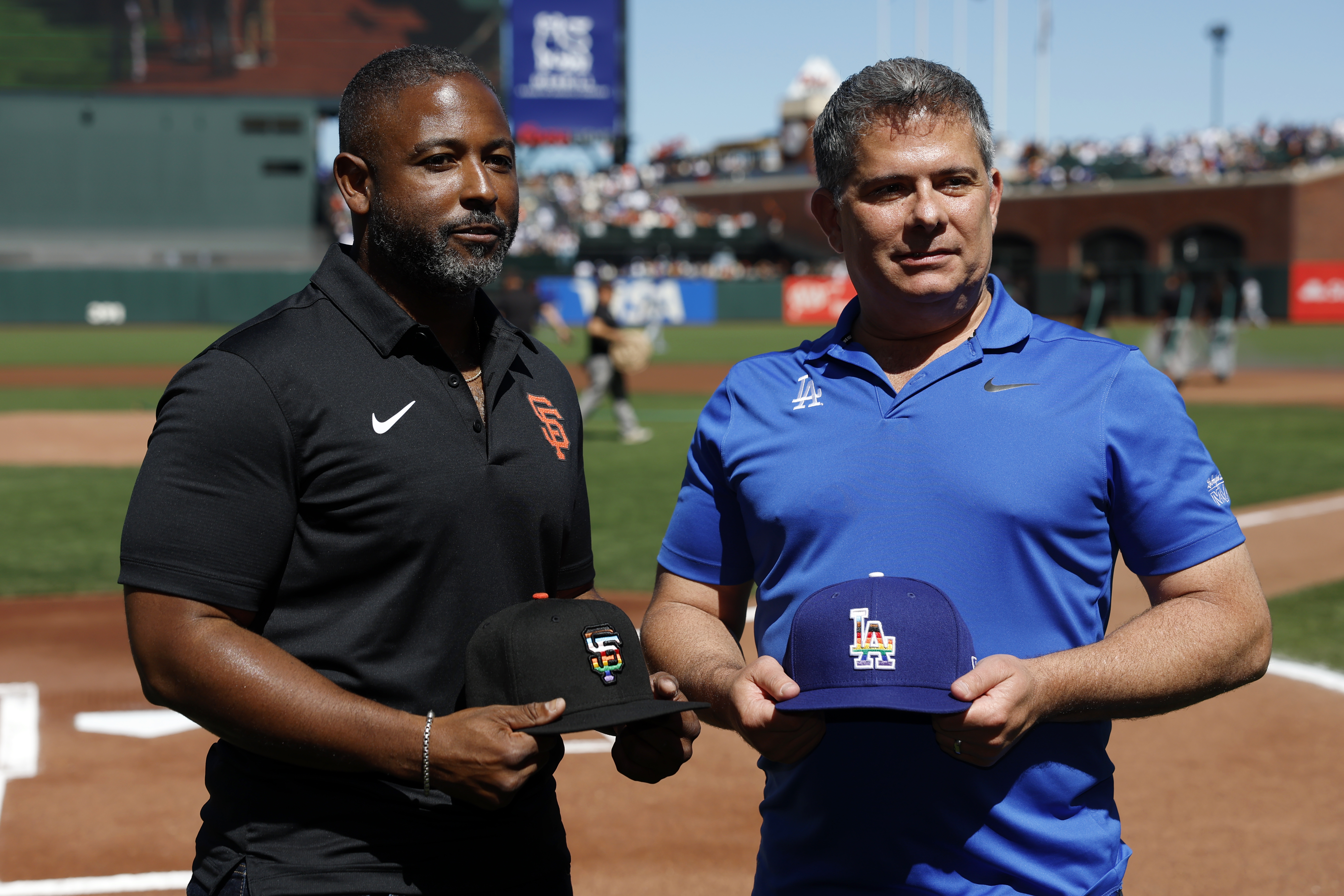 Roscoe Mapps, left, of the GIants, with Erik Braverman of the Dodgers at the Giants’ Pride Night in 2022.