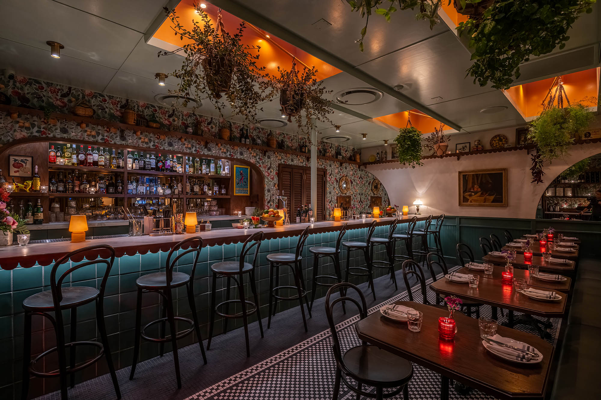 A bar with stools and tables at Donna’s restaurant in Echo Park, California.