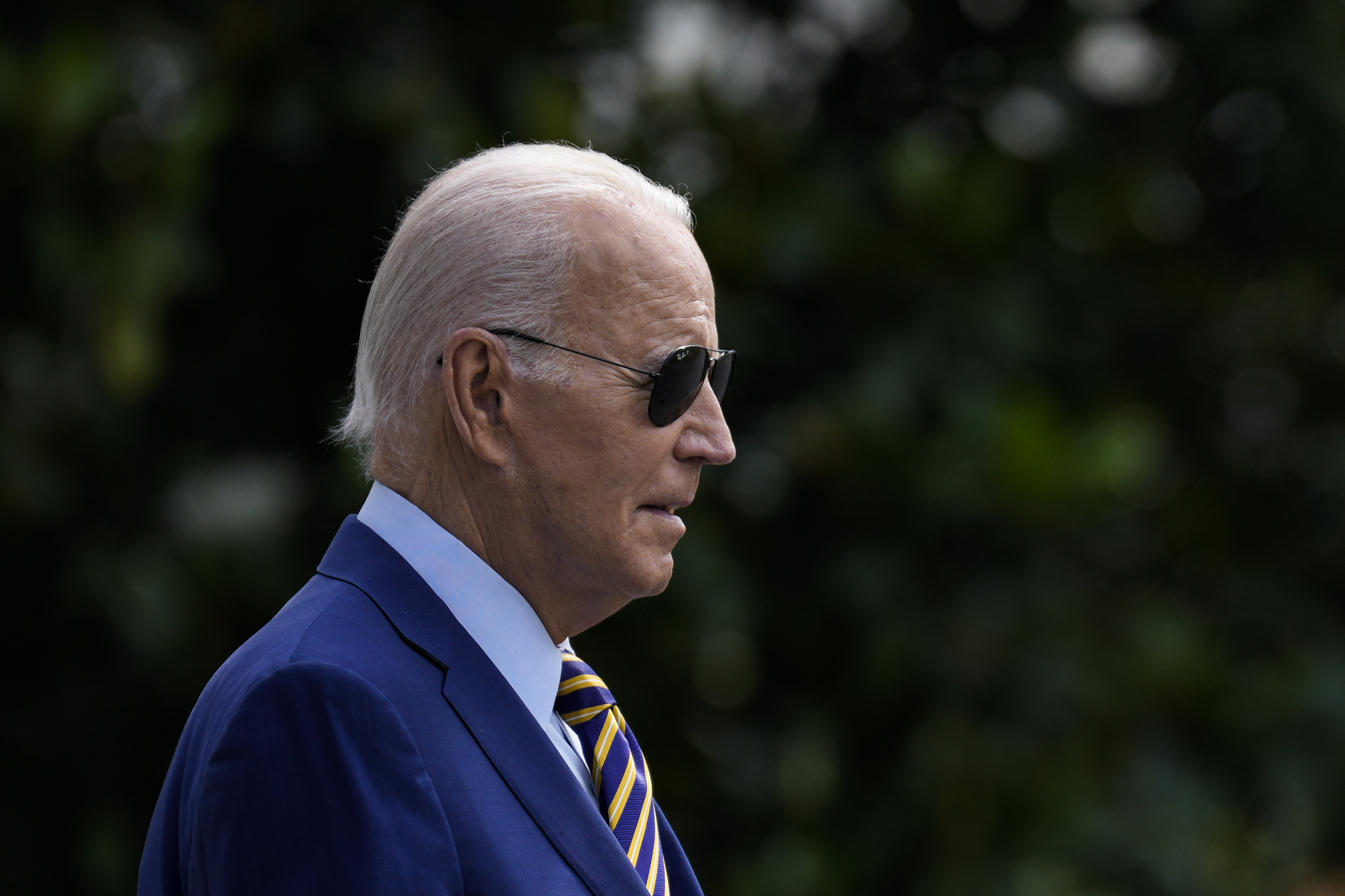 A profile shot of Biden wearing sunglasses