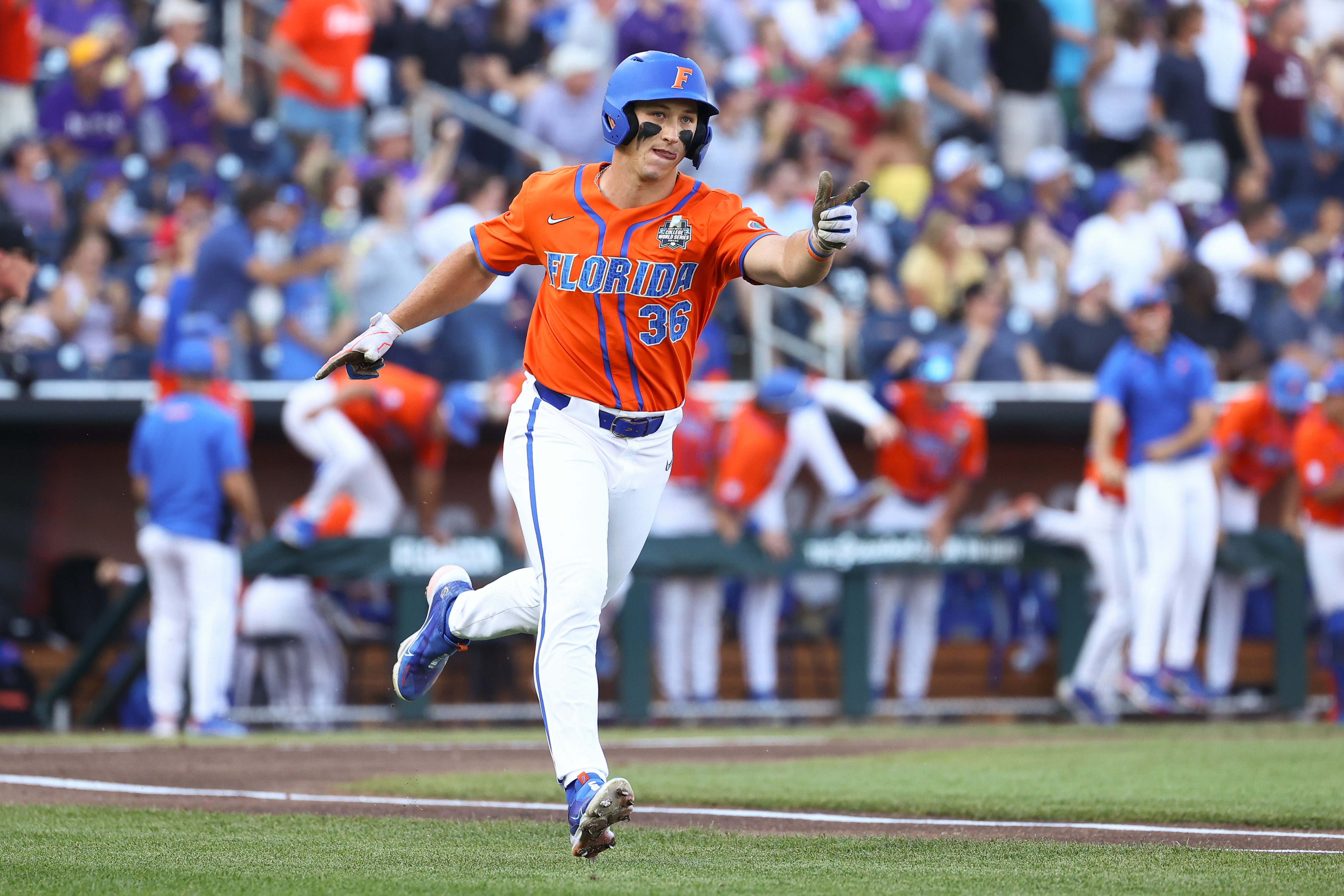 Wyatt Langford of the Florida Gators hits a home run against the LSU Tigers in the first inning of game three of the Division I Men’s Baseball Championship held at Charles Schwab Field on June 26, 2023 in Omaha, Nebraska.