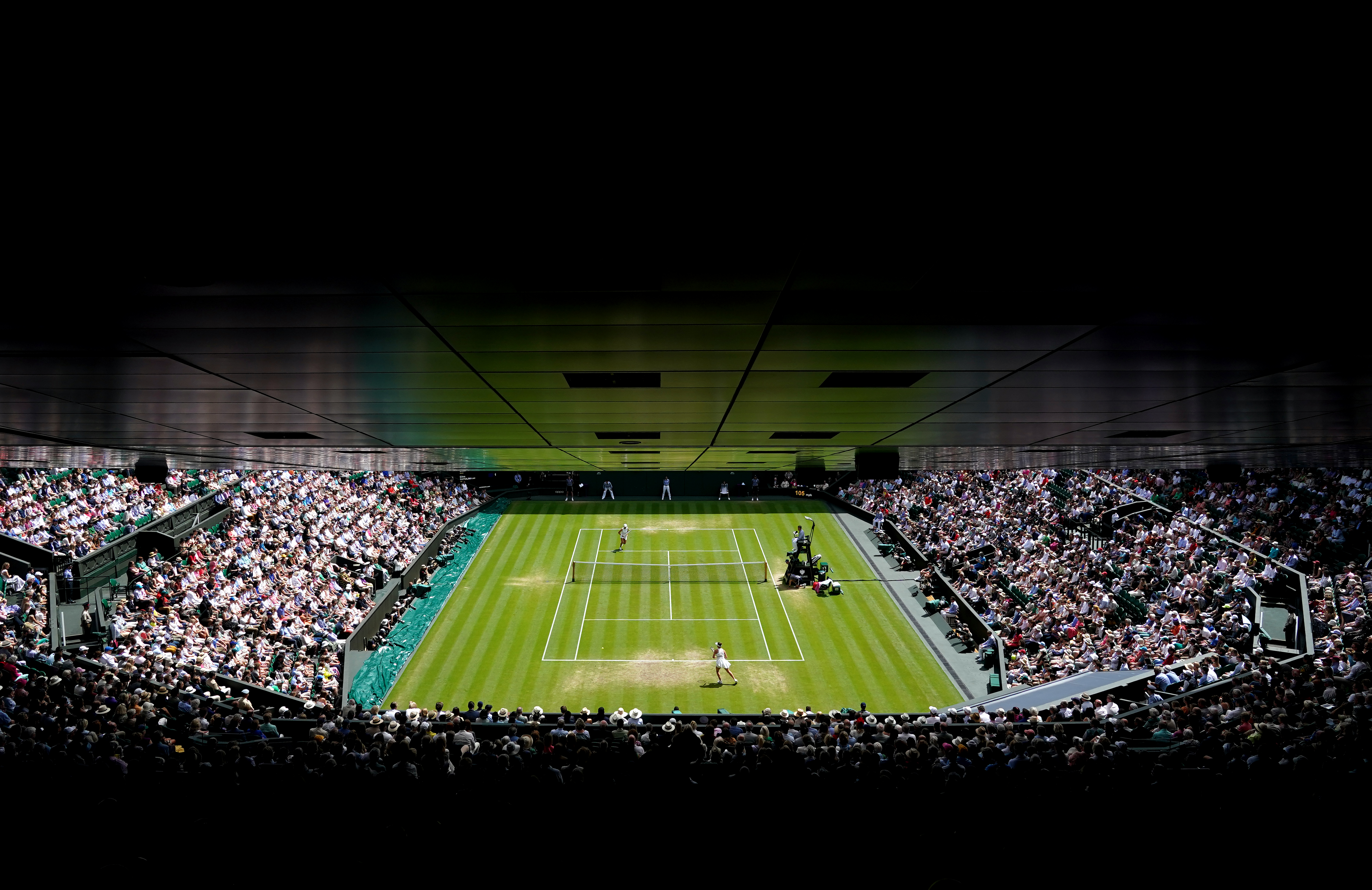 A general view of centre court as Iga Swiatek takes on Elina Svitolina in their ladies quarter final match on day nine of the 2023 Wimbledon Championships at the All England Lawn Tennis and Croquet Club in Wimbledon. Picture date: Tuesday July 11, 2023.