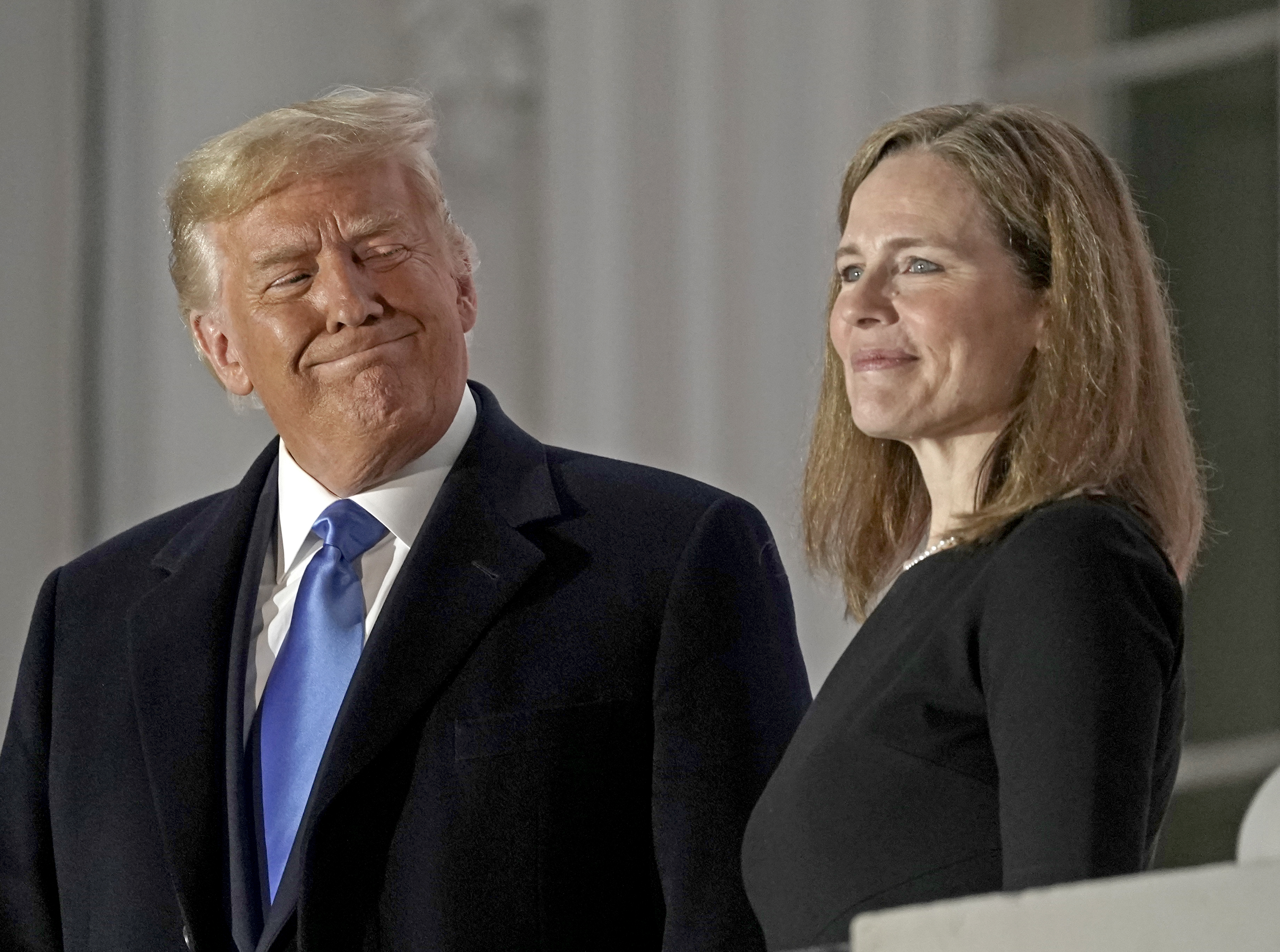 Donald Trump and Amy Coney Barrett smiling