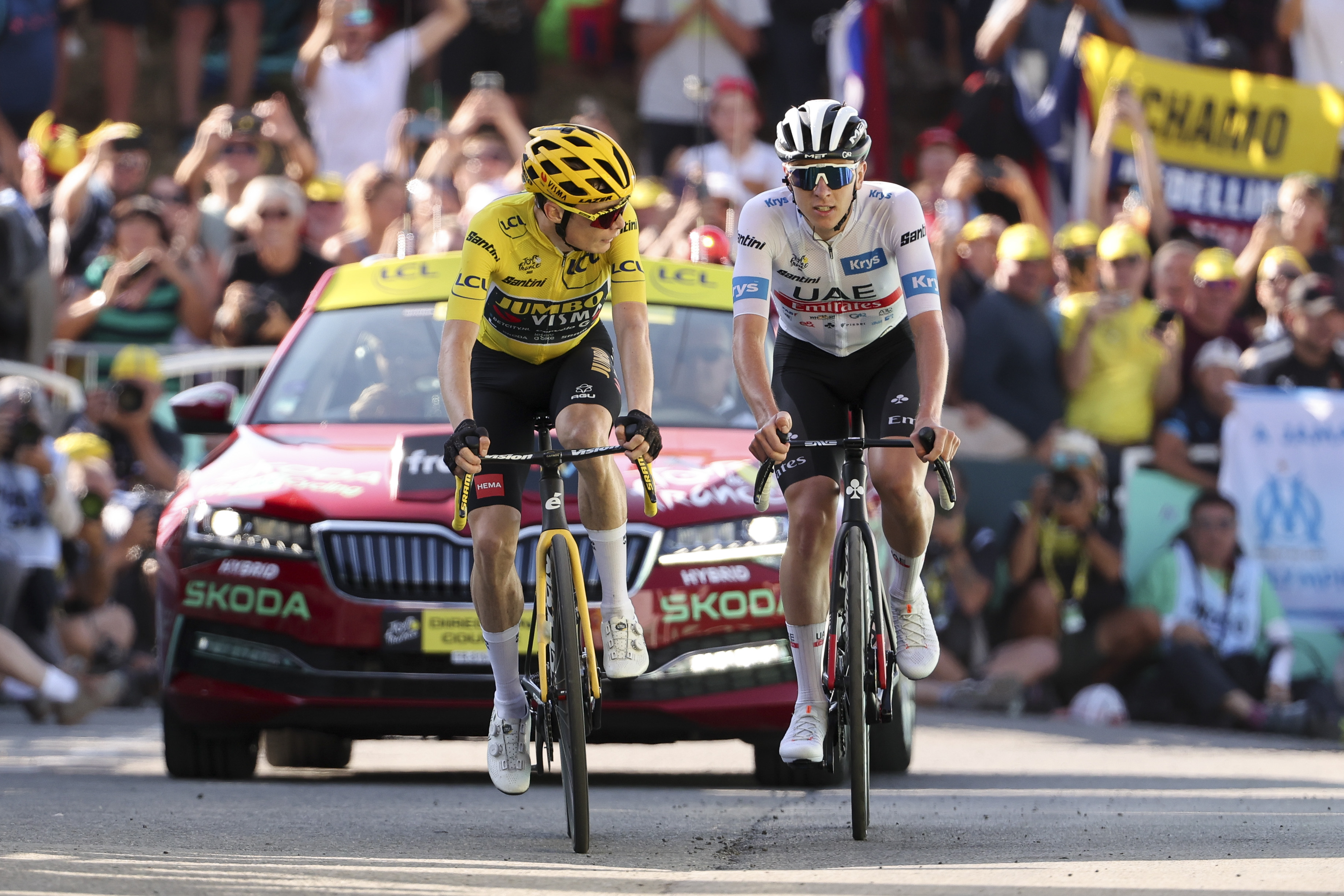 Yellow jersey, race leader Jonas Vingegaard of Denmark and Jumbo - Visma and White jersey of best young rider Tadej Pogacar of Slovenia and UAE Team Emirates cross the finish line of stage fifteen of the 110th Tour de France 2023, a 179km stage from Les Gets les Portes du Soleil to Saint-Gervais Mont-Blanc 1379m / #UCIWT / on July 16, 2023 in Saint-Gervais Mont-Blanc, France.