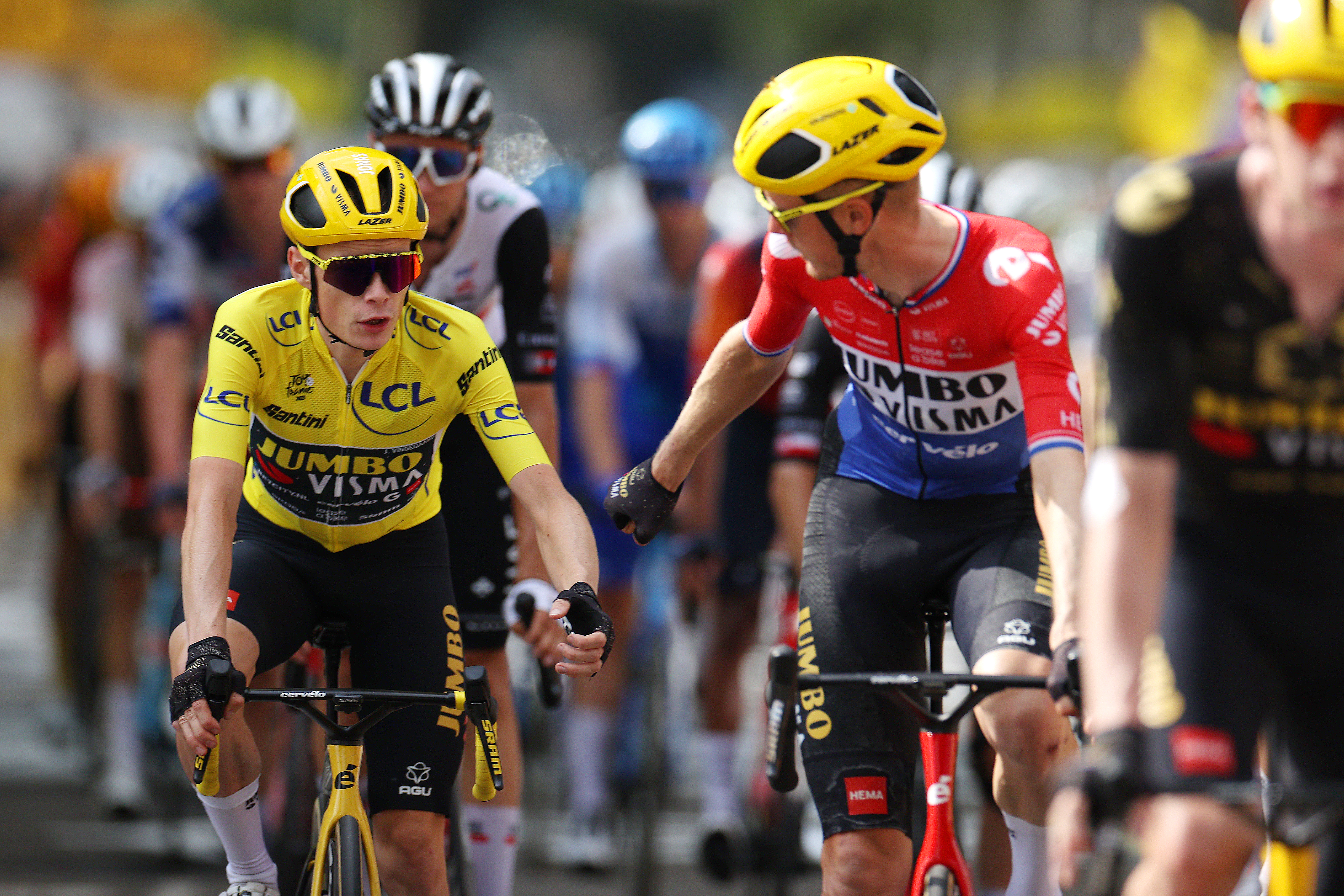 Jonas Vingegaard of Denmark - Yellow Leader Jersey and Dylan Van Baarle of The Netherlands and Team Jumbo-Visma react after the stage nineteen of the 110th Tour de France 2023 a 172.8km stage from Moirans-en-Montagne to Poligny / #UCIWT / on July 21, 2023 in Poligny, France.