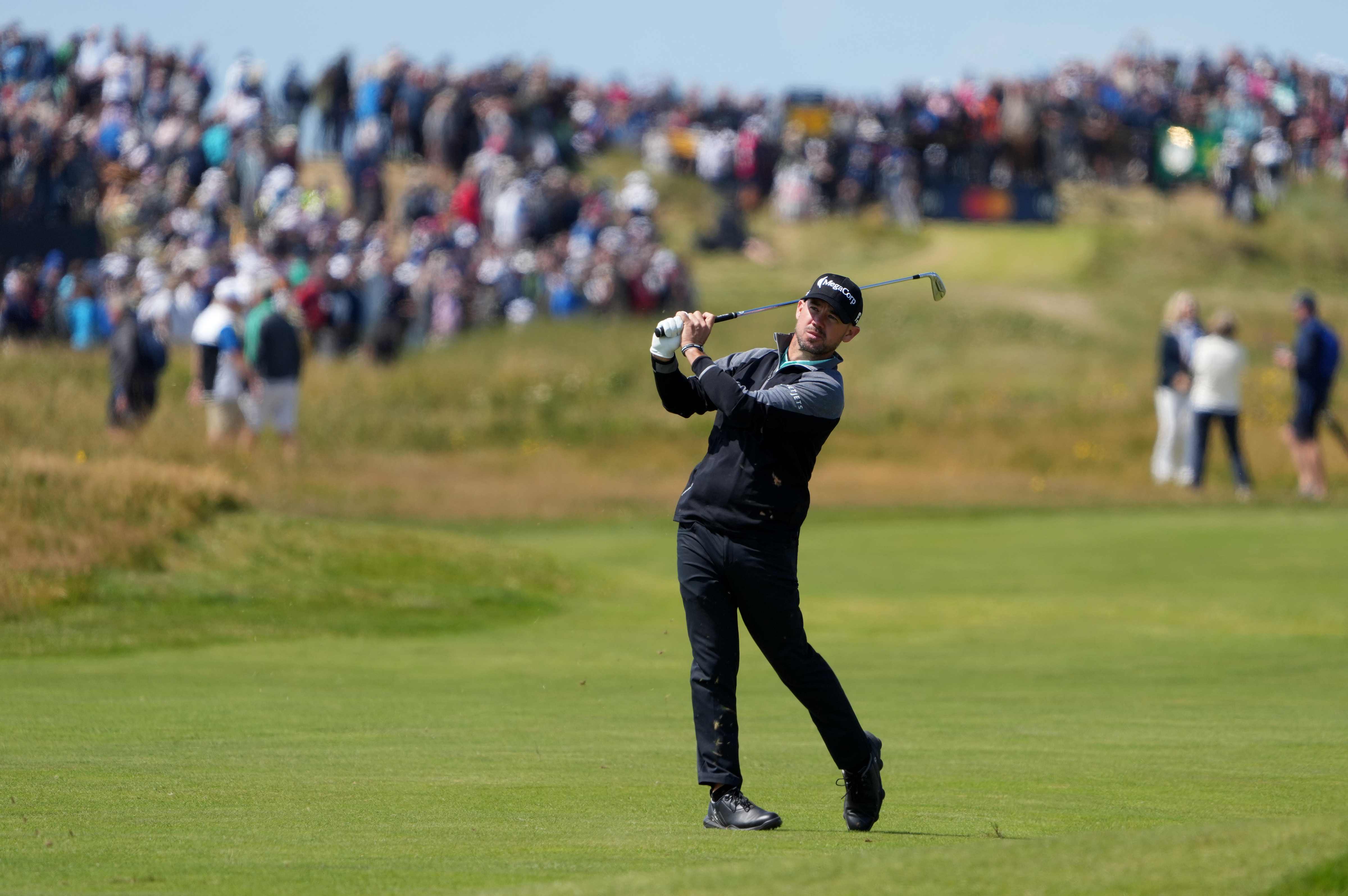 Brian Harman plays on the fifteenth hole during the second round of The Open Championship golf tournament at Royal Liverpool.