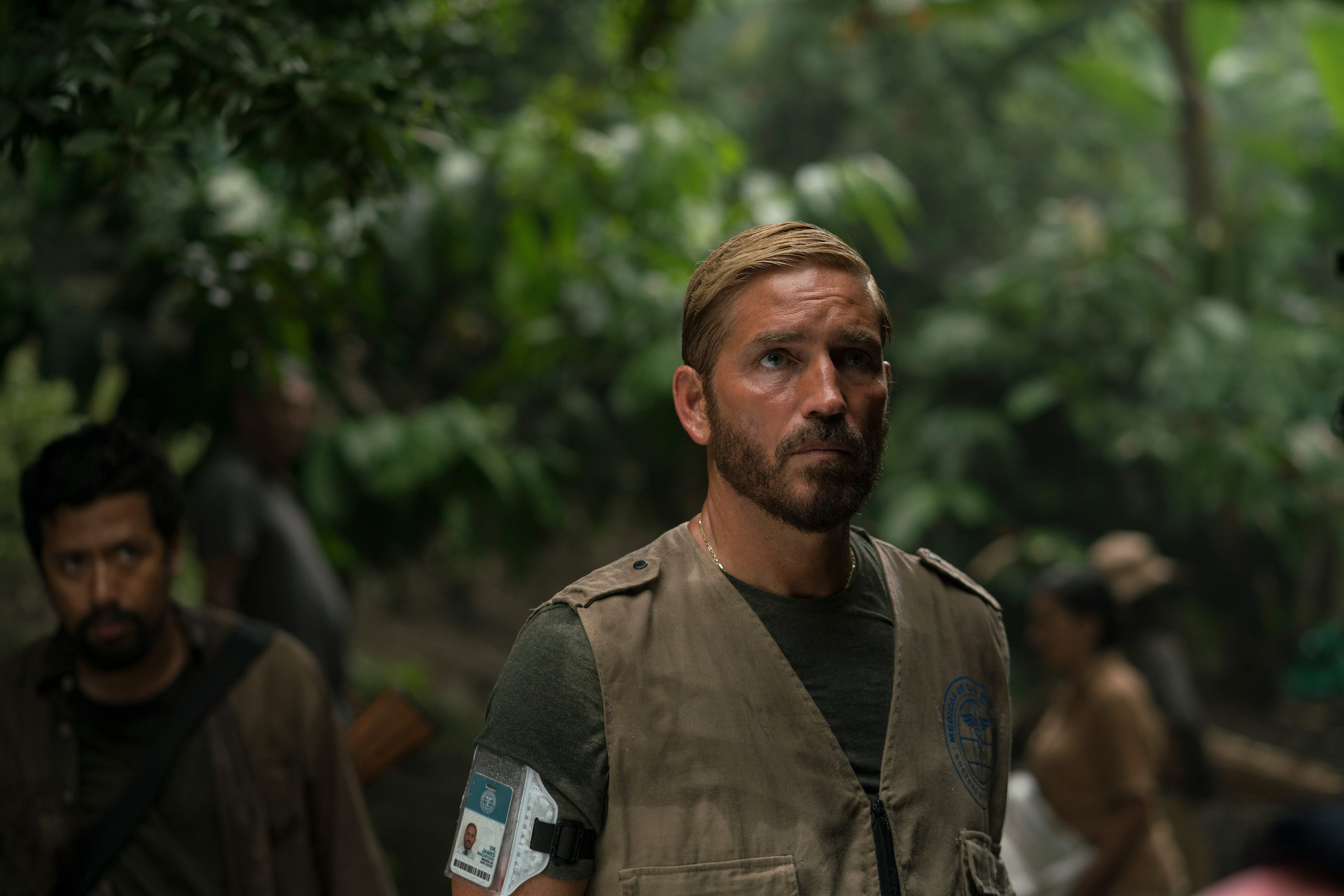 Jim Caviezel in Sound of Freedom wearing a vest in the jungle