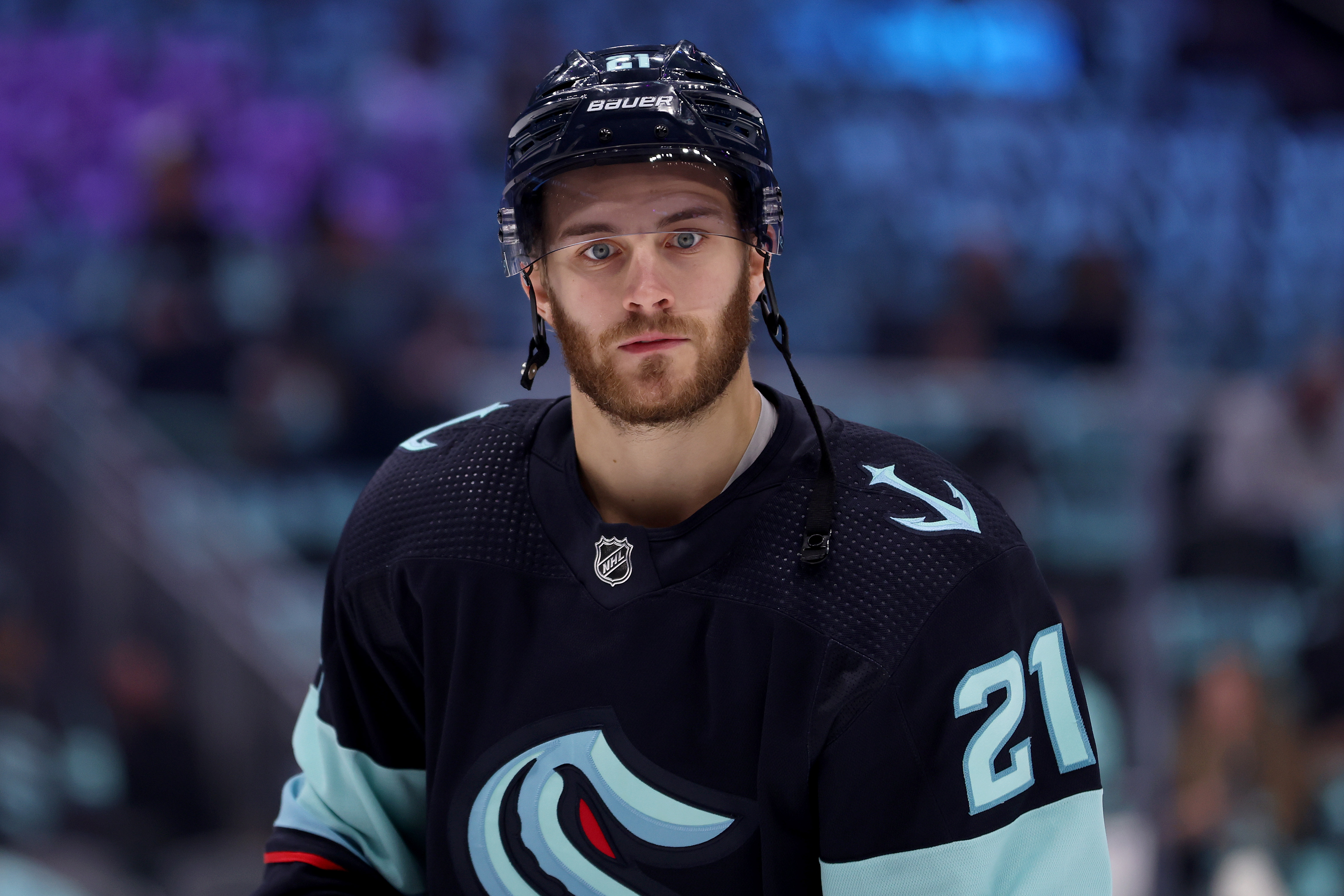 Alex Wennberg #21 of the Seattle Kraken looks on before Game Six of the Second Round of the 2023 Stanley Cup Playoffs against the Dallas Stars at Climate Pledge Arena on May 13, 2023 in Seattle, Washington. (from getty)