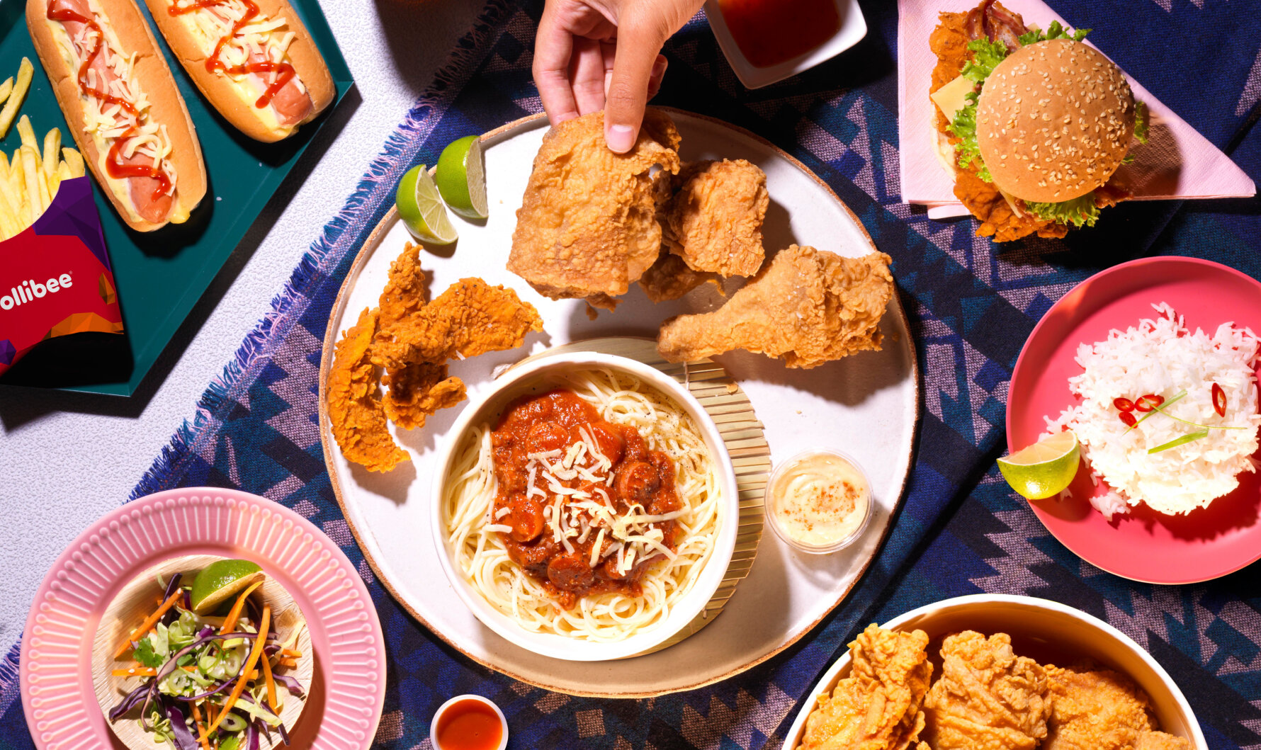 An overhead photograph of fried chicken and spaghetti from Filipino fast food chain Jollibee.