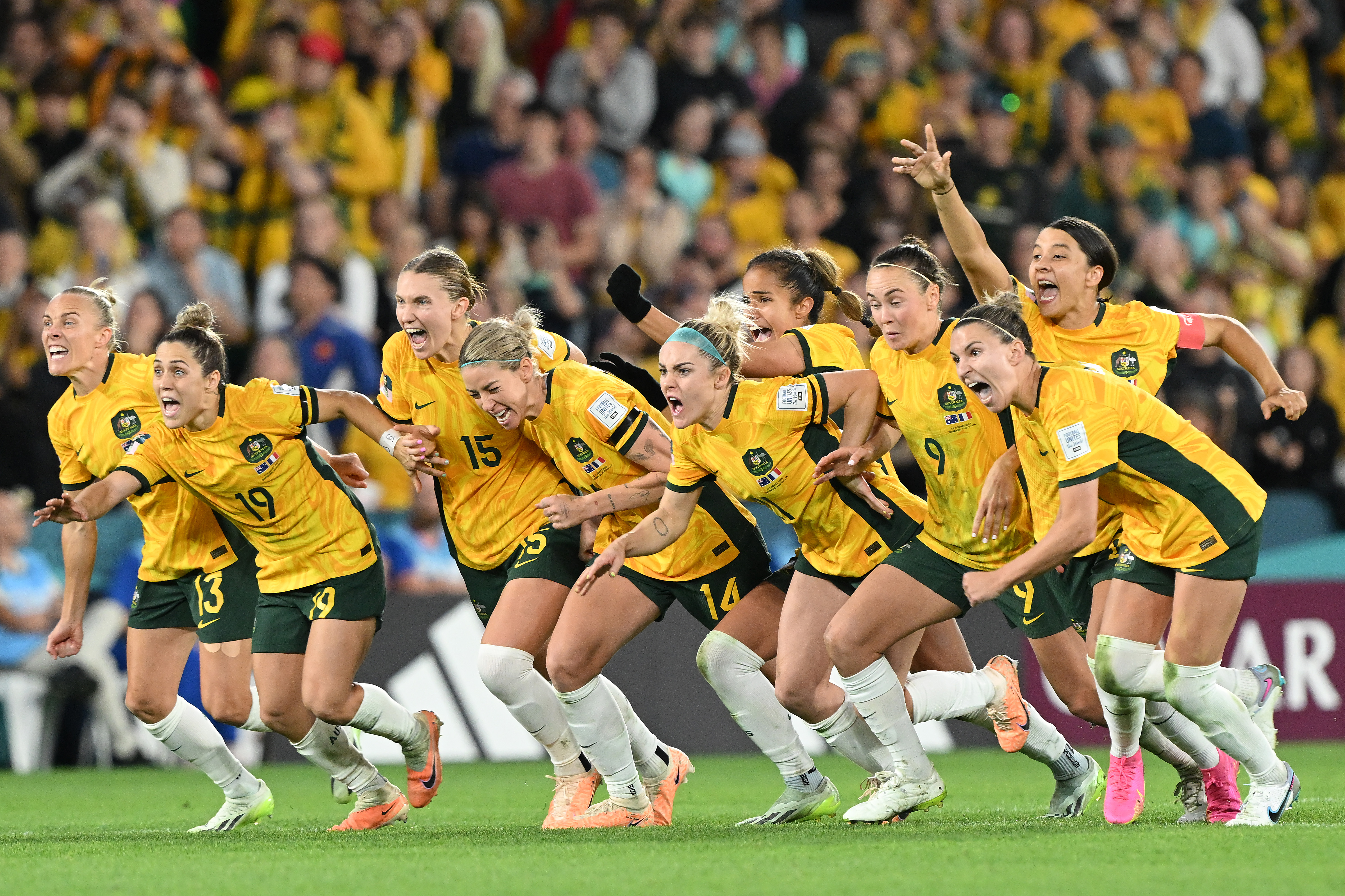Australia players celebrate the team’s victory through the penalty shoot out following the FIFA Women’s World Cup Australia &amp; New Zealand 2023 Quarter Final match between Australia and France at Brisbane Stadium on August 12, 2023 in Brisbane / Meaanjin, Australia.