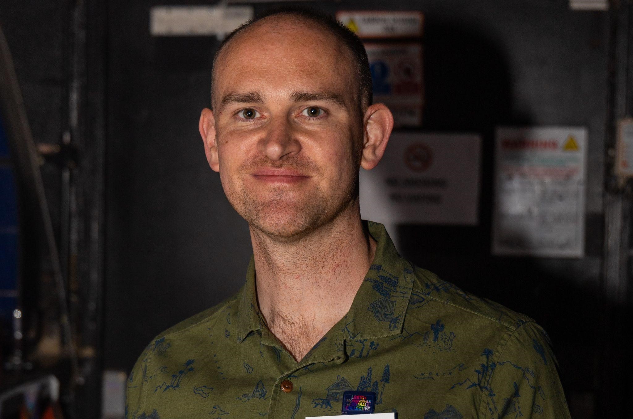 Facial photo of LGBTQ journalist Jon Holmes