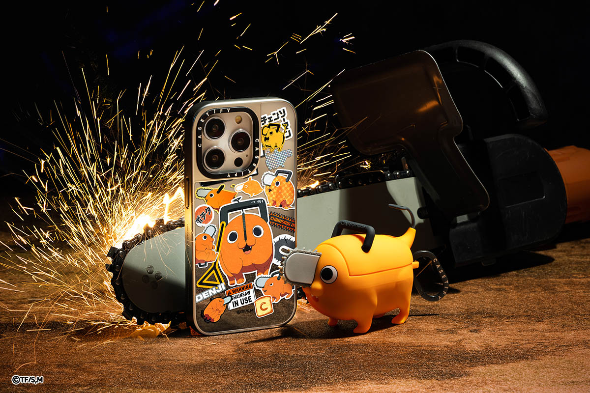 A stock photo of the Pochita iPhone case and Airpods case modeled in front of a chainsaw