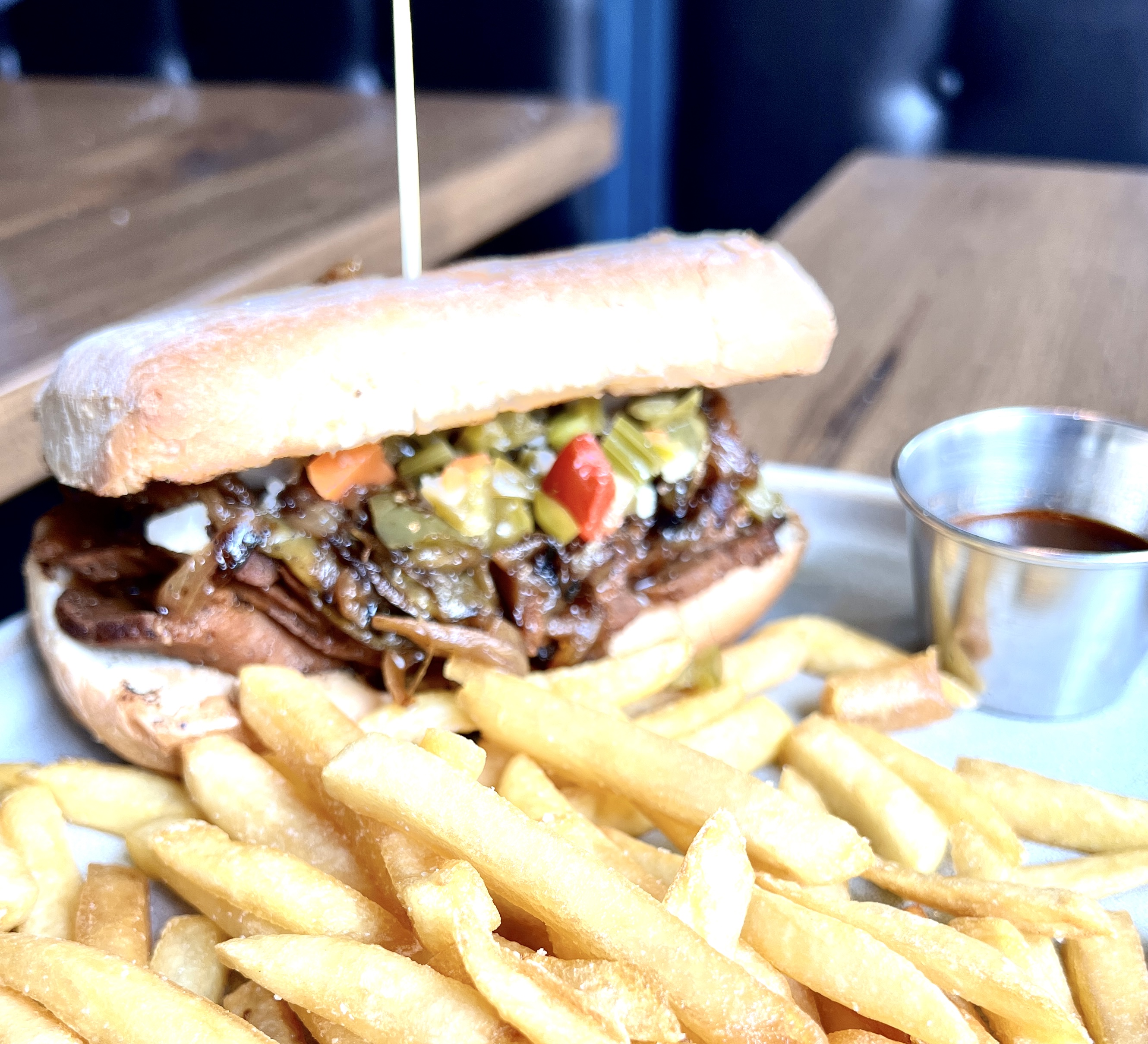 A vegan Italian beef with fries.