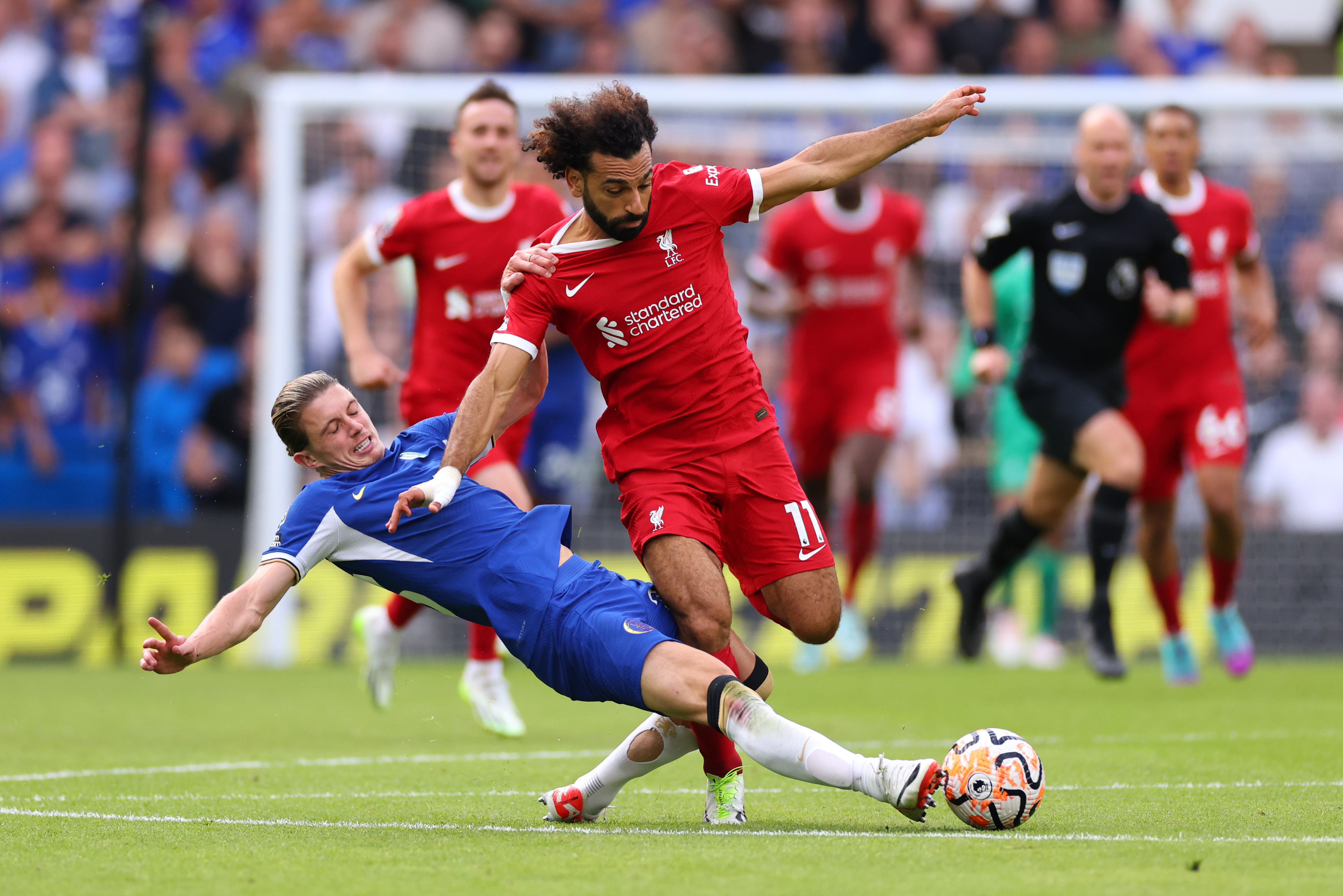 Mohamed Salah in action with Conor Gallagher - Chelsea FC v Liverpool FC - Premier League