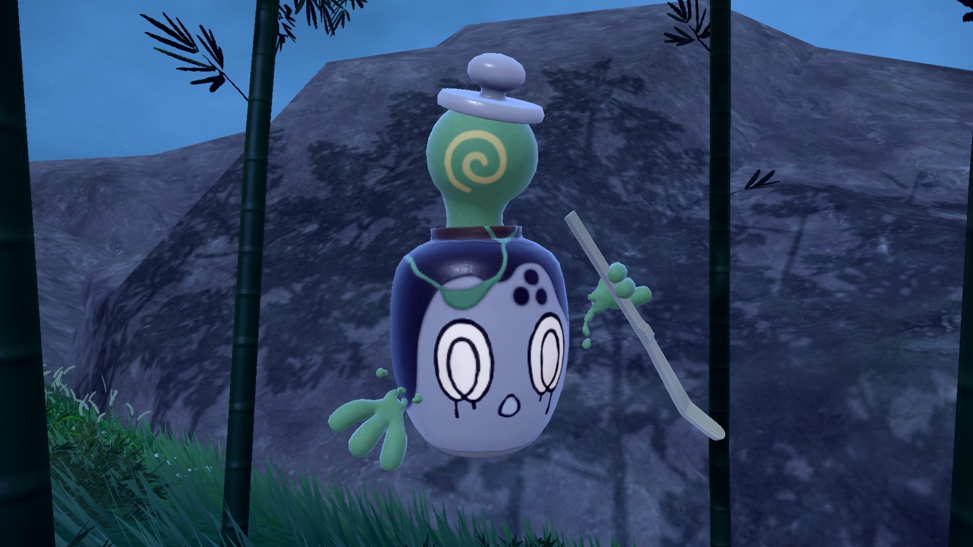 An image of the new Polteagiest Pokémon, Poltchagiest. Poltchagiest looks like a tiny tea caddy with a crack in it and a painted face on it. It’s floating in the air.  