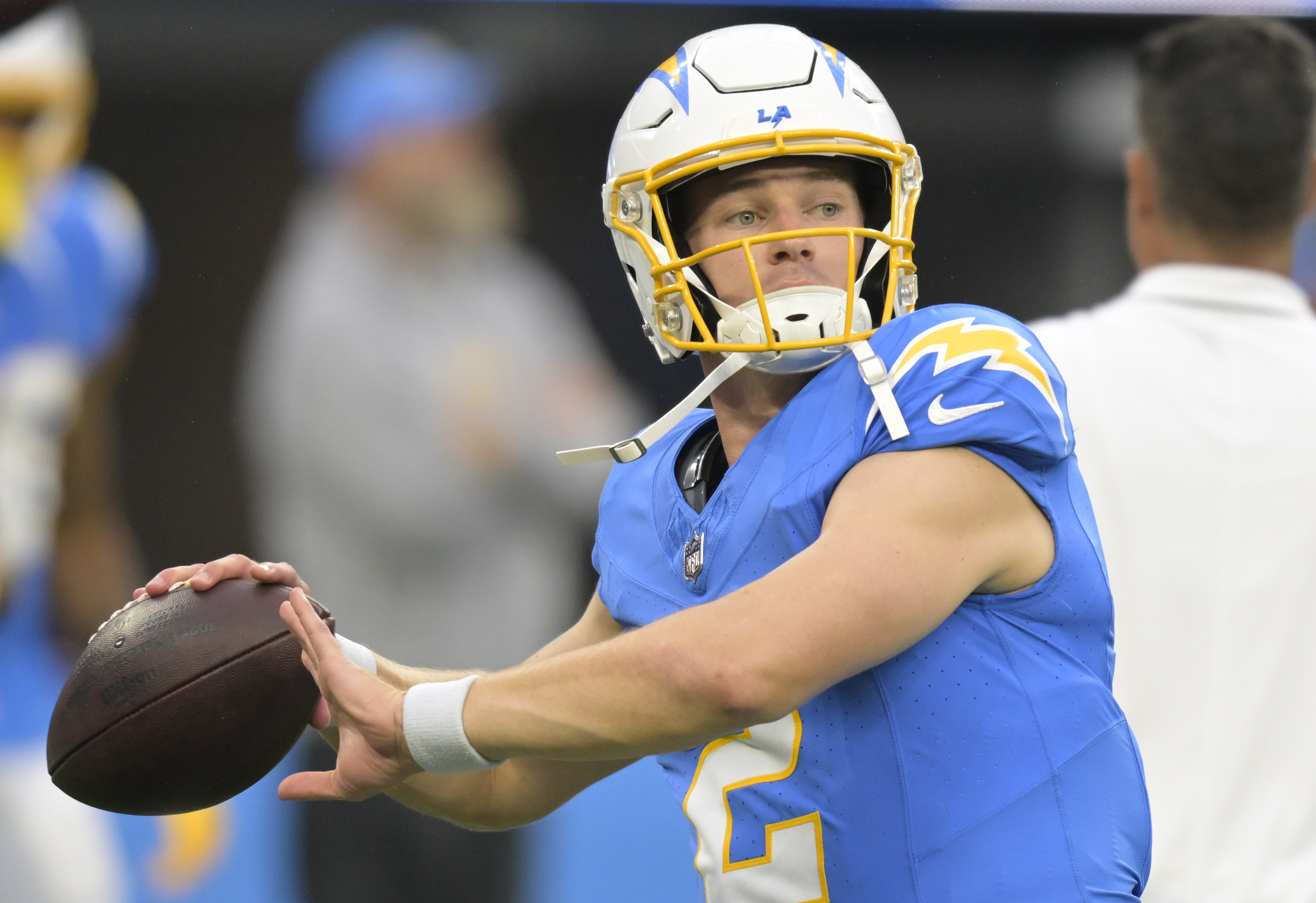 Quarterback Easton Stick #2 of the Los Angeles Chargers warms up before playing the New Orleans Saints at SoFi Stadium during a preseason game on August 20, 2023 in Inglewood, California.
