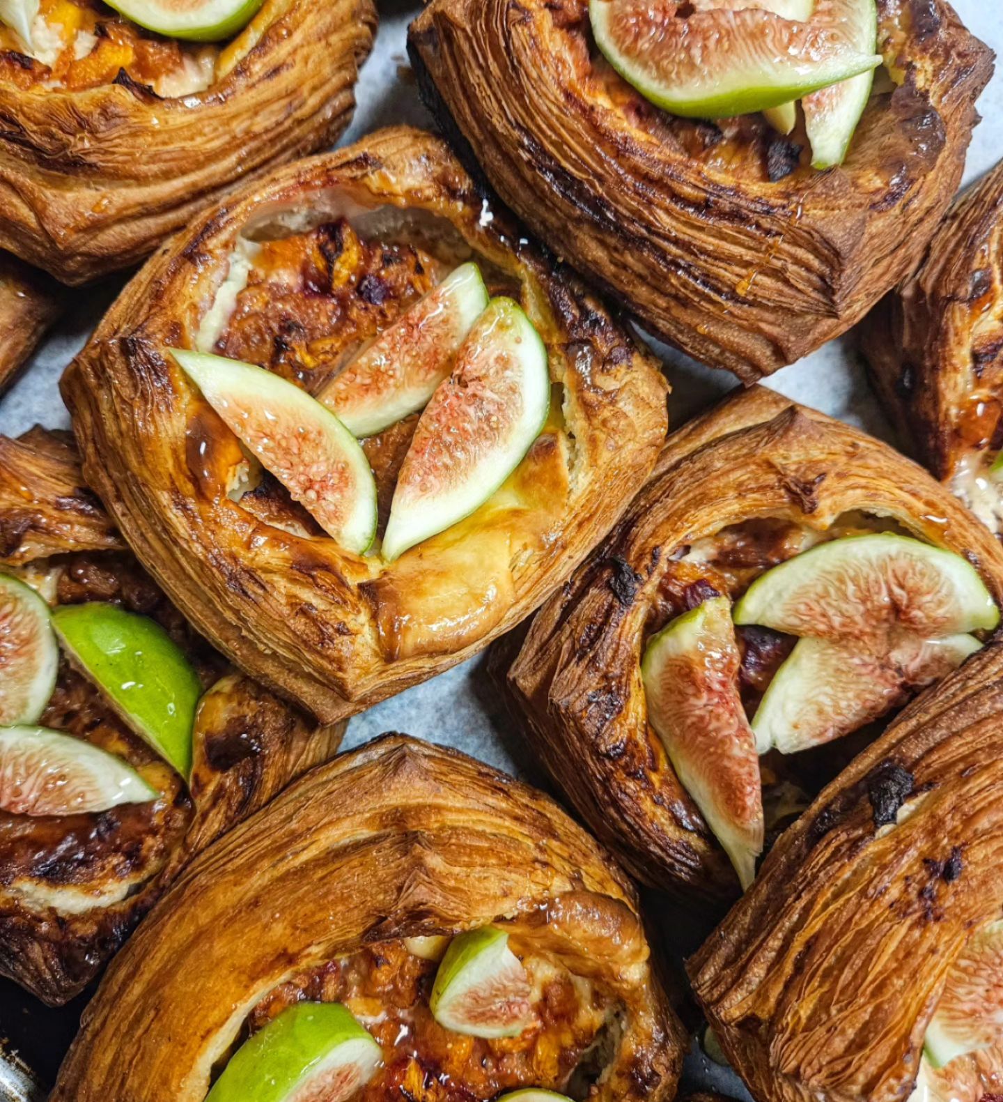 Fig Danishes piled on top of each other. 