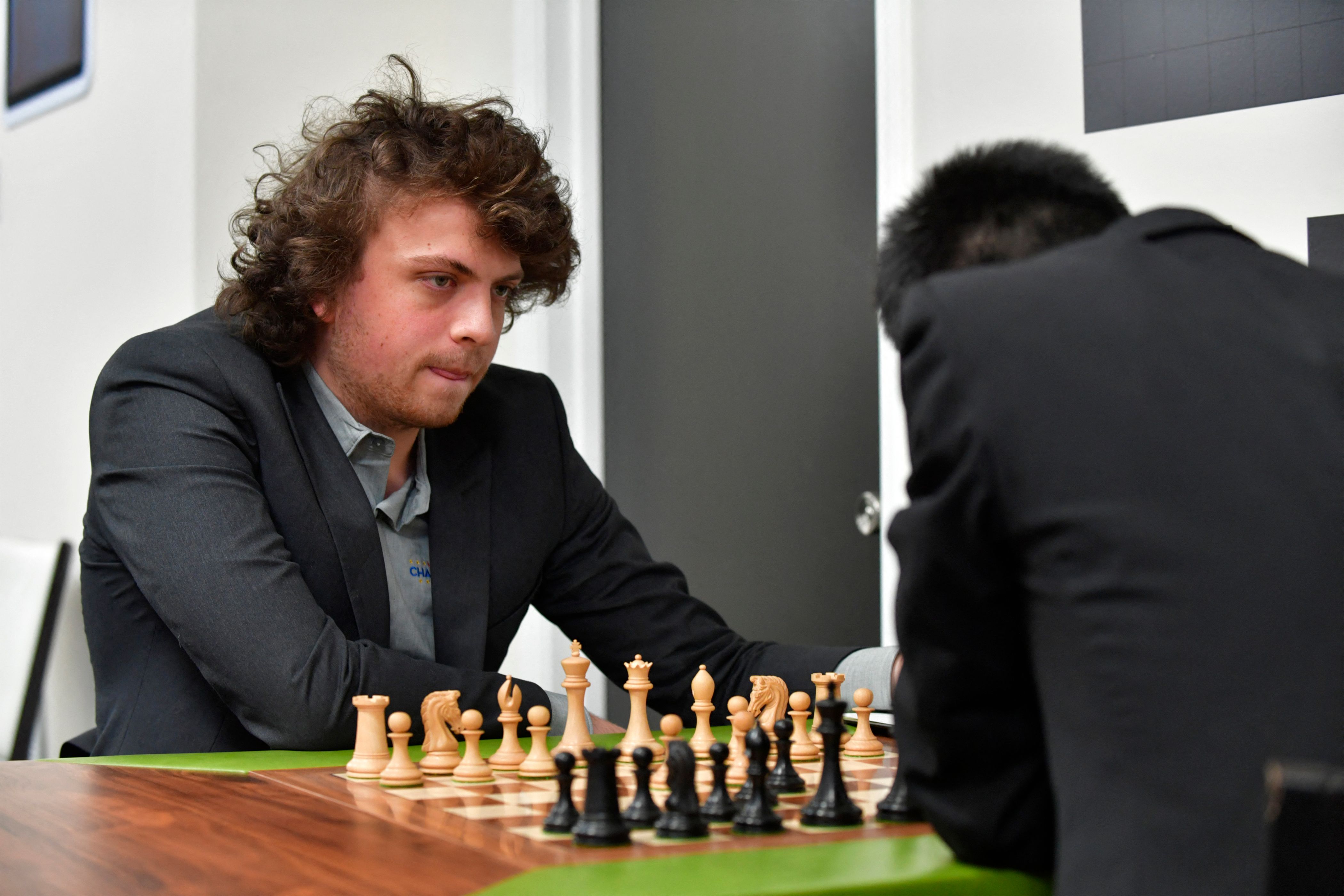 &nbsp;US international grandmaster Hans Niemann waits his turn to move during a second-round chess game against Jeffery Xiong on the second day of the Saint Louis Chess Club Fall Chess Classic in St. Louis, Missouri, on October 6, 2022. (from getty)