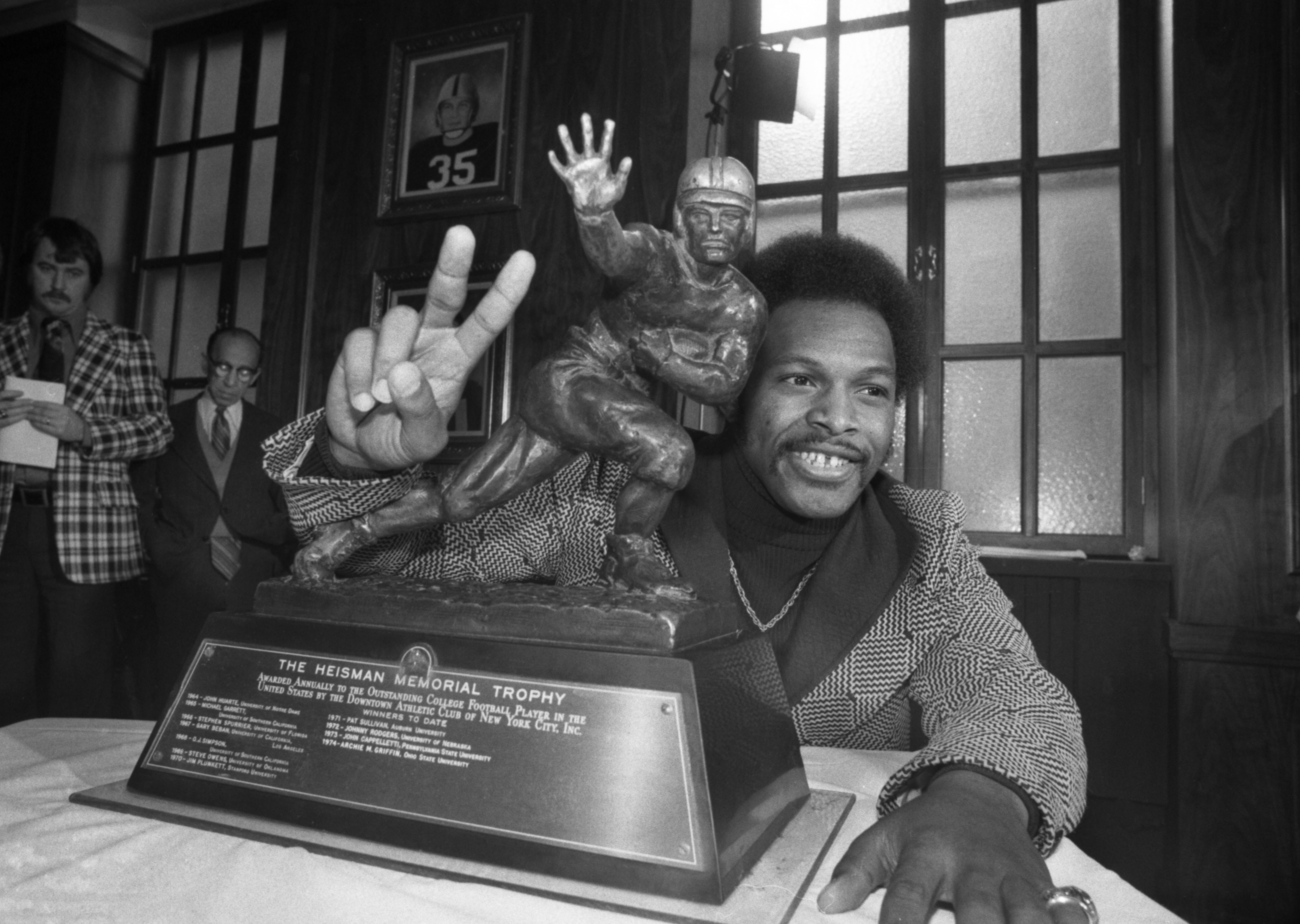 Archie Griffin Poses with the Heisman Trophy