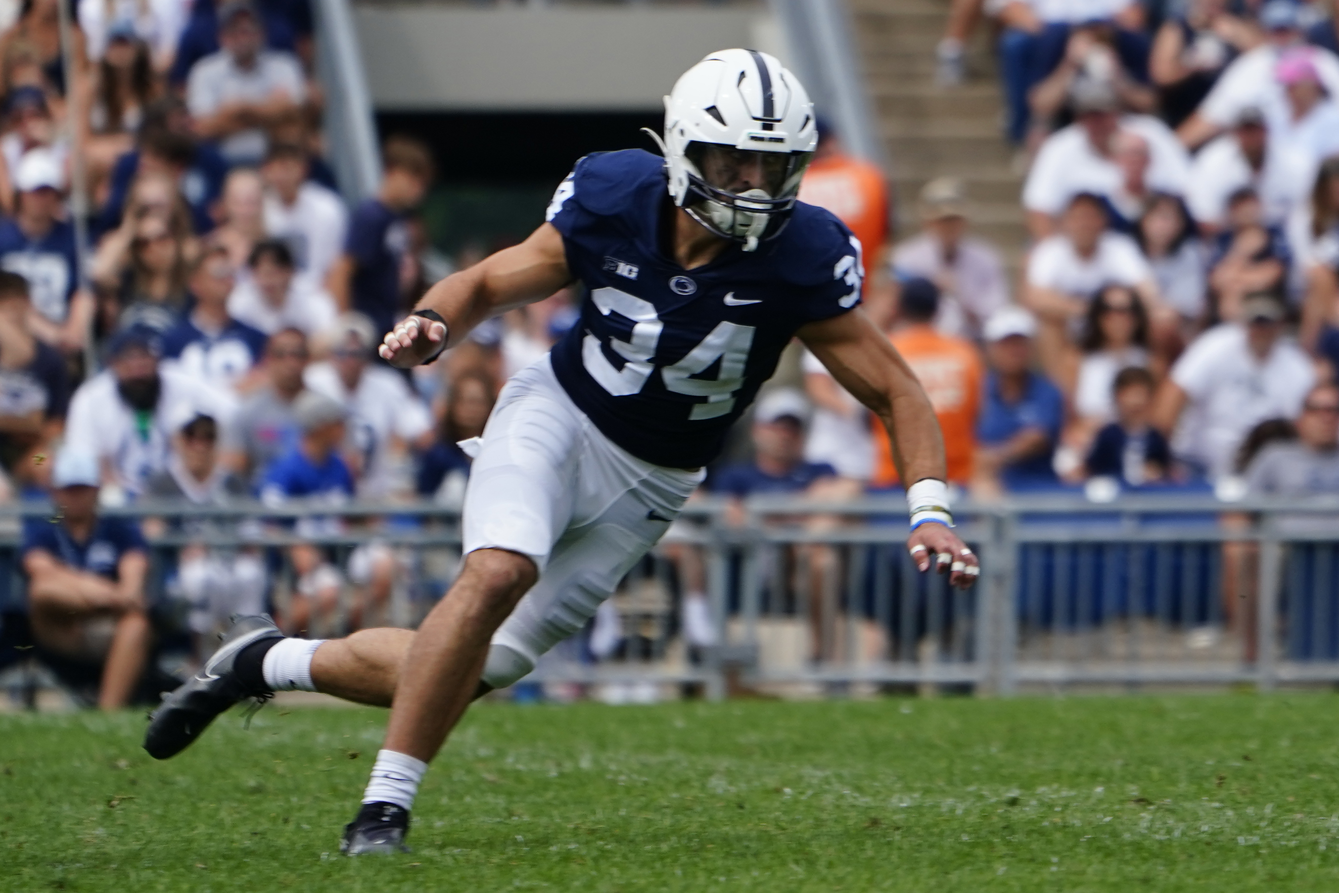 Penn State Nittany Lions Linebacker Dominic DeLuca (34) rushes the quarterback during the first half of the College Football game between the Ohio Bobcats and Penn State Nittany Lions on September 10, 2022. Dominic now wears Number Zero.