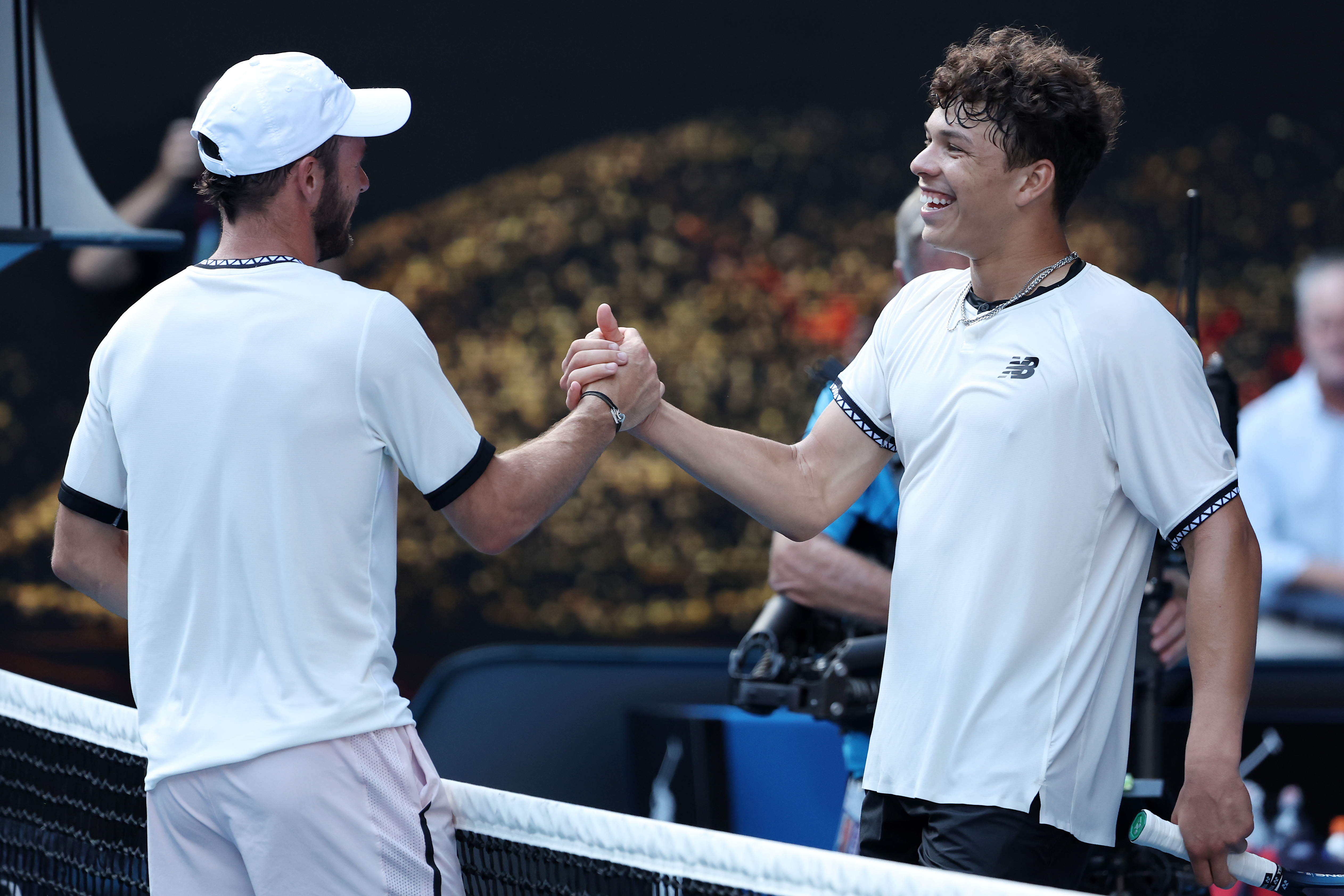 Tommy Paul of the United States and Ben Shelton of the United States embrace at the net in the Quarterfinal singles match during day ten of the 2023 Australian Open at Melbourne Park on January 25, 2023 in Melbourne, Australia.
