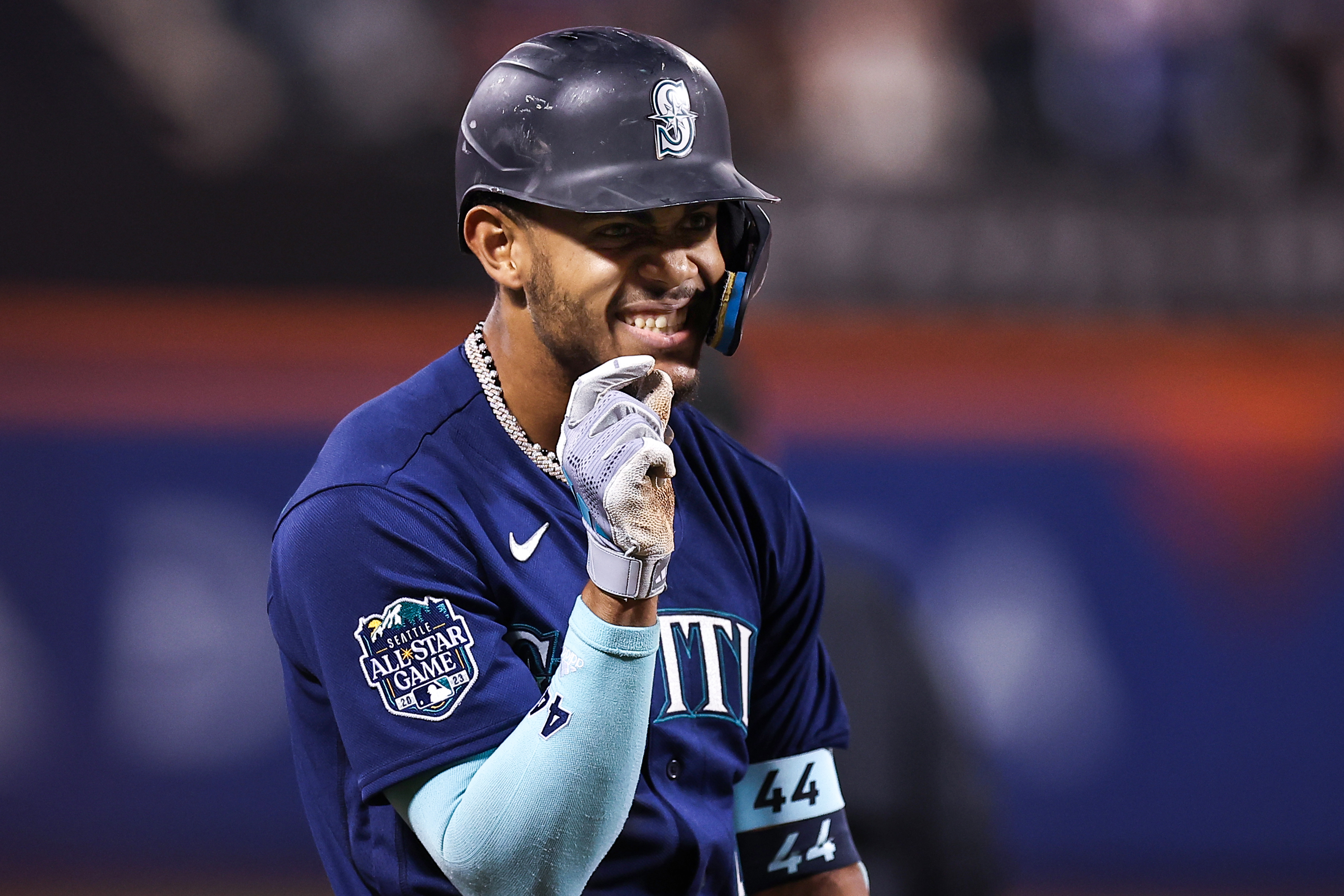 Julio Rodríguez of the Seattle Mariners reacts after hitting a triple during the third inning against the New York Mets at Citi Field on September 02, 2023 in New York City.