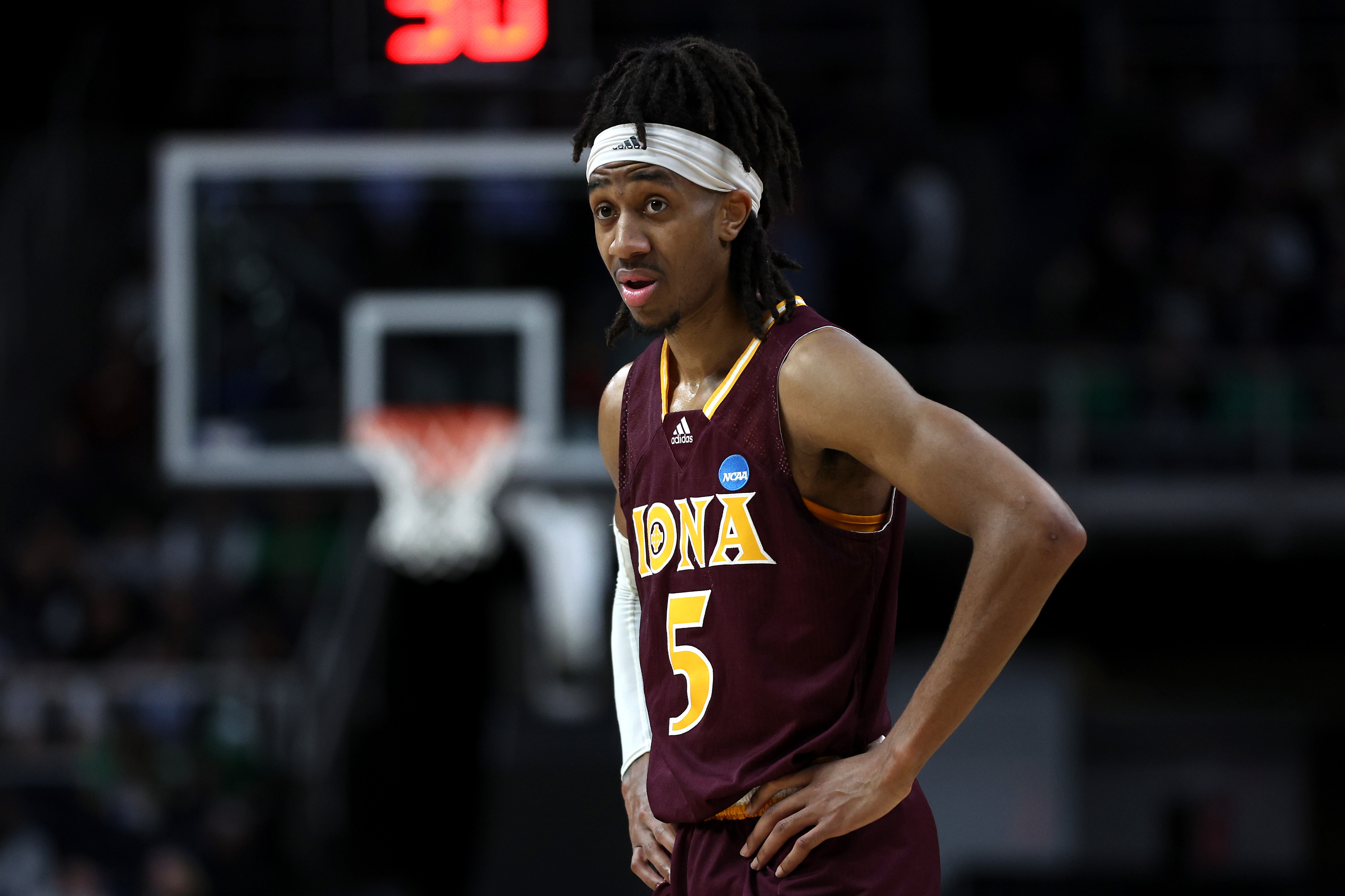 Daniss Jenkins #5 of the Iona Gaels looks on late in the second half against the Connecticut Huskies during the first round of the NCAA Men’s Basketball Tournament at MVP Arena on March 17, 2023 in Albany, New York.