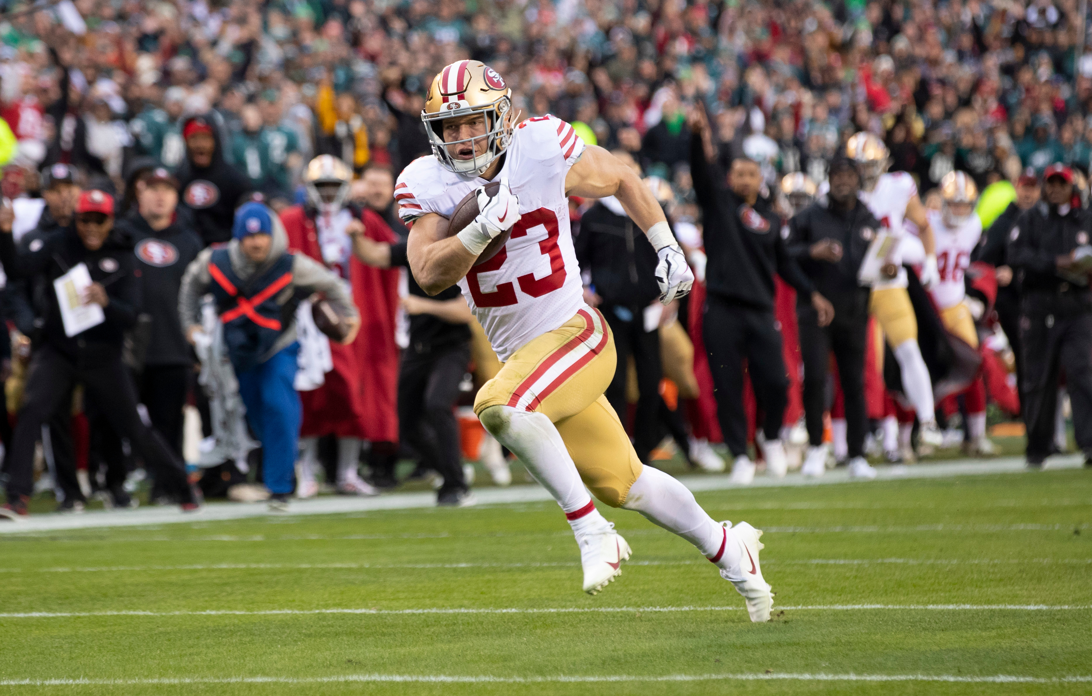 Christian McCaffrey #23 of the San Francisco 49ers rushes for a 23-yard touchdown during the NFC Championship playoff game against the Philadelphia Eagles at Lincoln Financial Field on January 29, 2023 in Philadelphia, Pennsylvania. The Eagles defeated the 49ers 31-7.