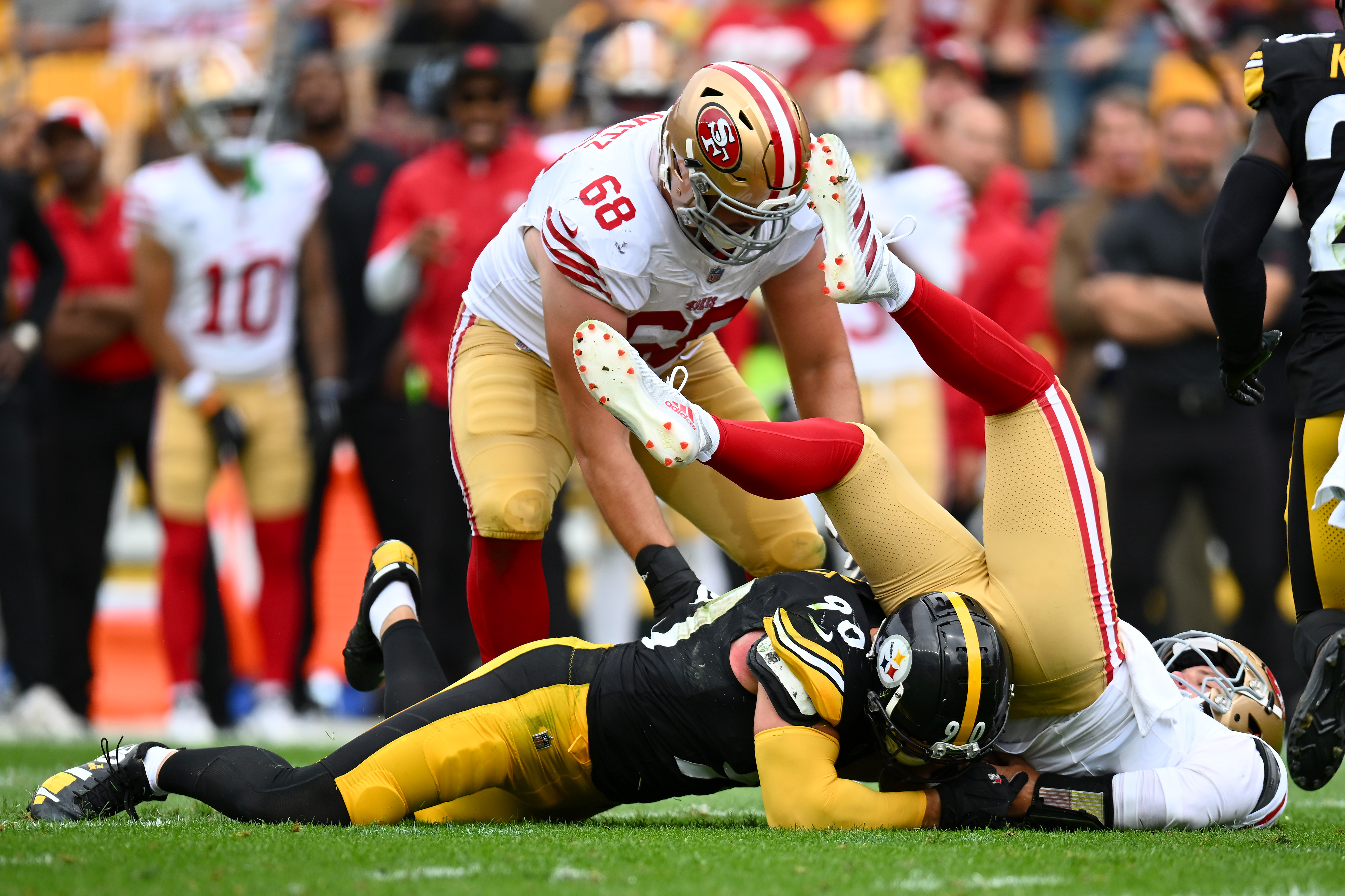Brock Purdy #13 of the San Francisco 49ers is sacked by T.J. Watt #90 of the Pittsburgh Steelers in in the second quarter of a game at Acrisure Stadium on September 10, 2023 in Pittsburgh, Pennsylvania.