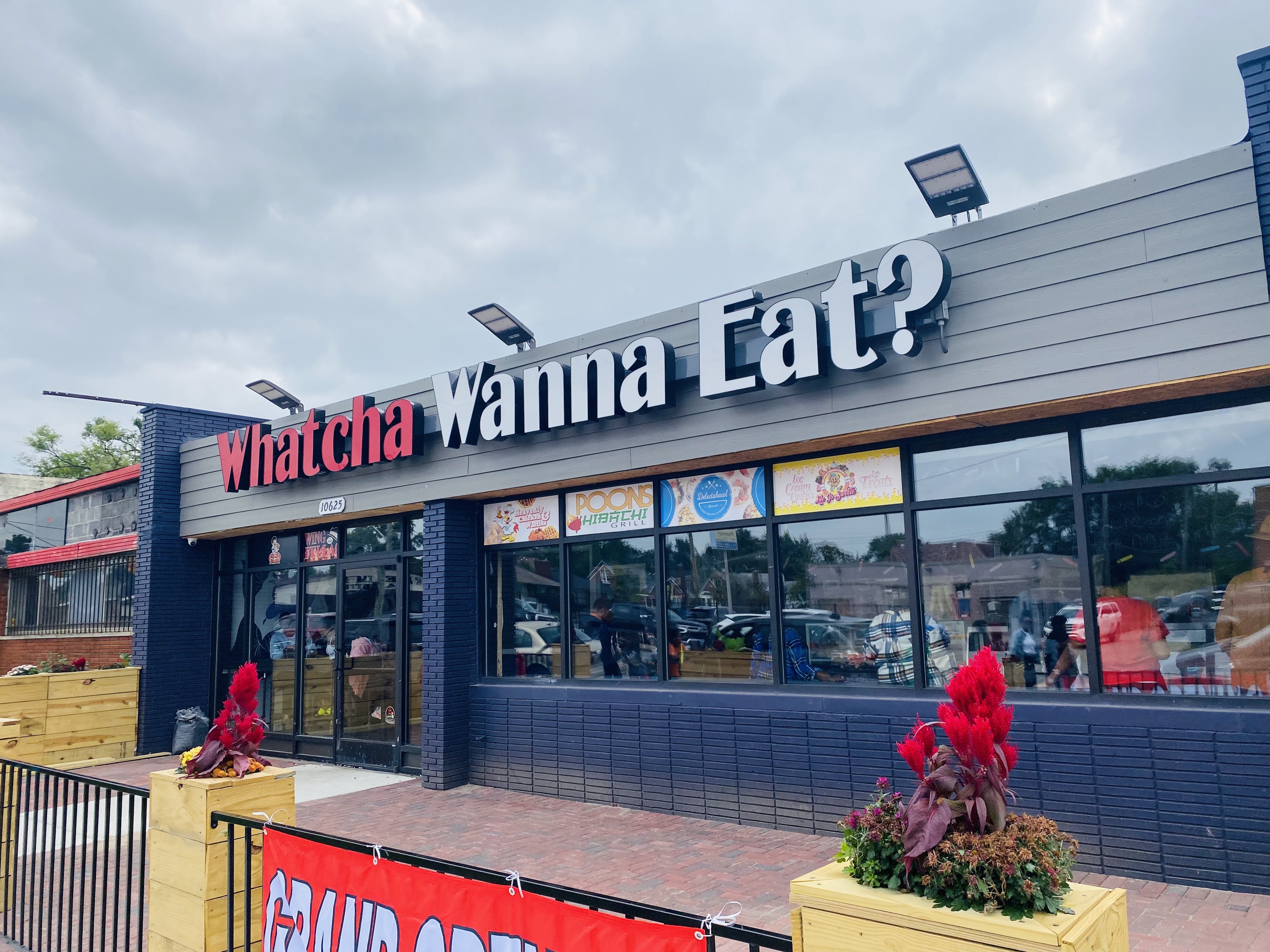 The entrance of Whatcha Wanna Eat Food Hall in Detroit, Michigan.