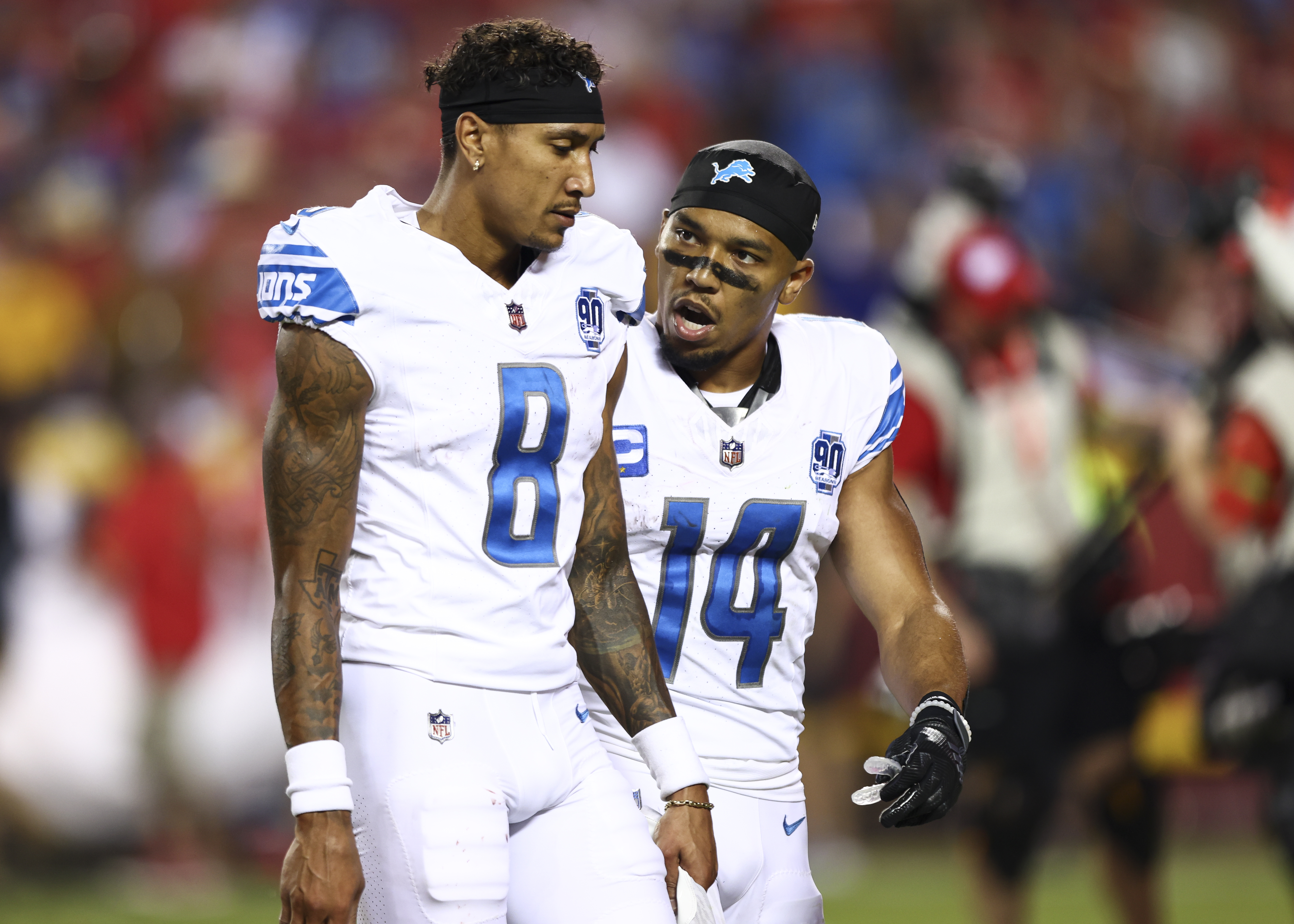 Amon-Ra St. Brown of the Detroit Lions talks with Josh Reynolds during halftime of an NFL football game against the Kansas City Chiefs at GEHA Field at Arrowhead Stadium on September 7, 2023 in Kansas City, Missouri.