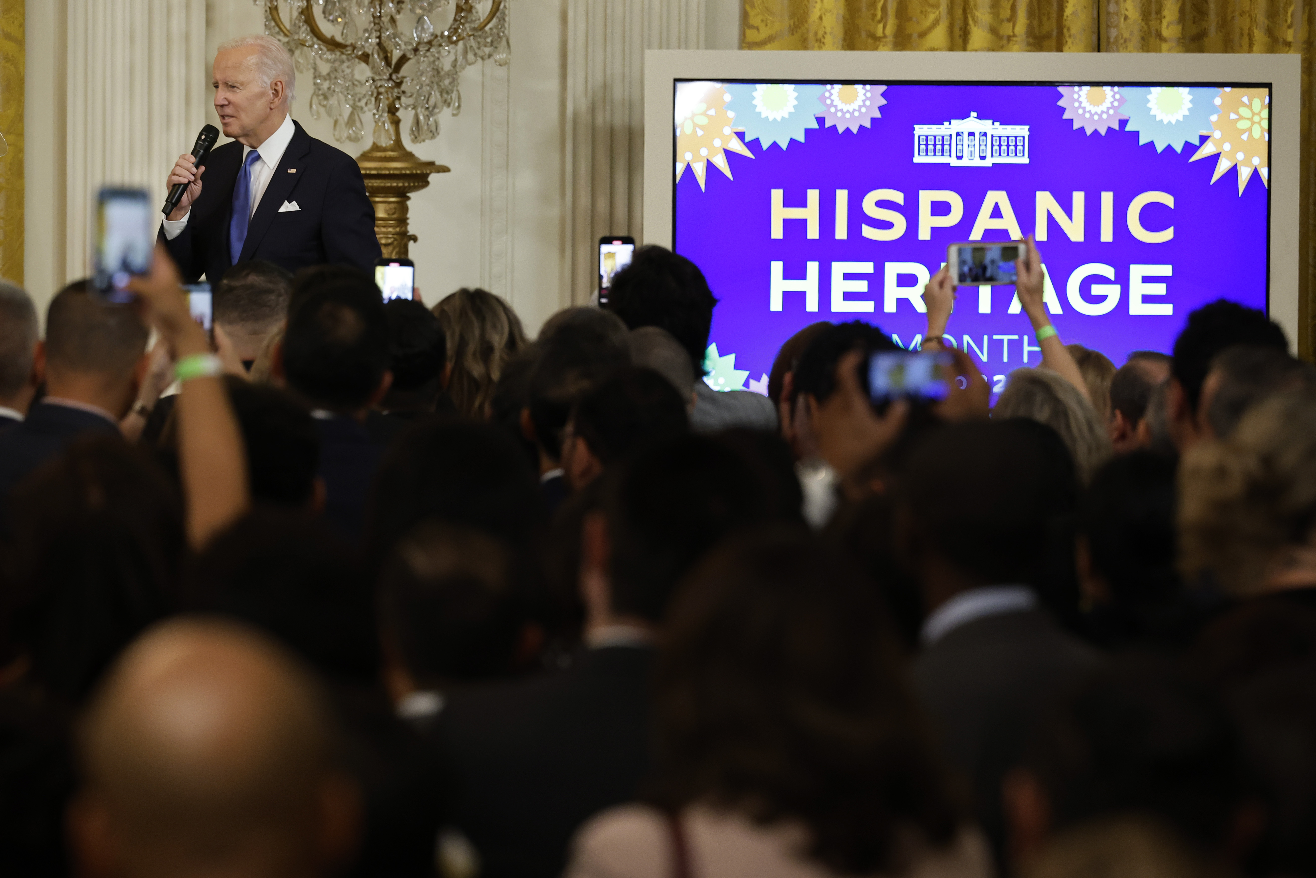 President Biden speaks before a crowd at the White House’s Hispanic Heritage Month reception.