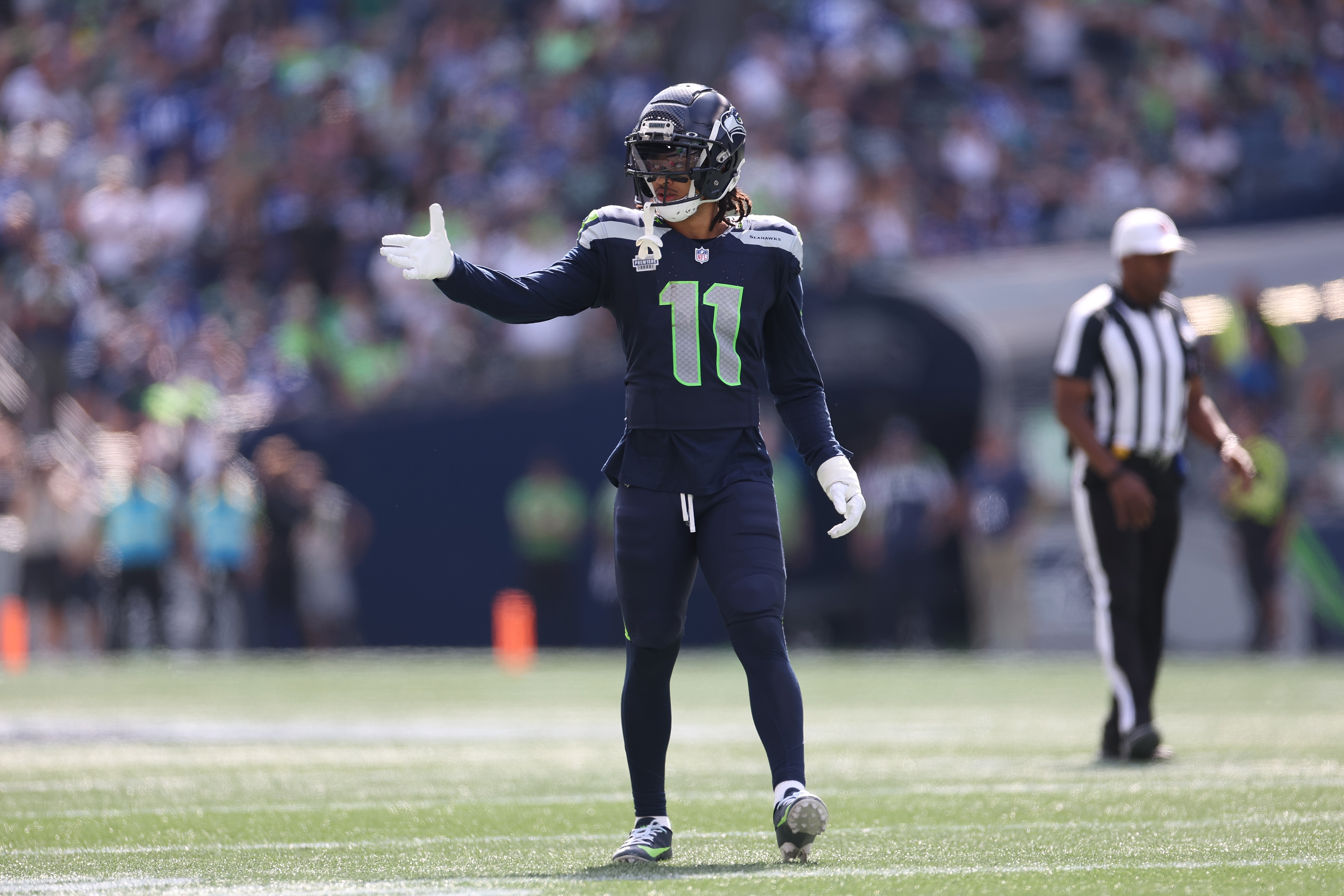 Jaxon Smith-Njigba #11 of the Seattle Seahawks reacts during the first half against the Los Angeles Rams at Lumen Field on September 10, 2023 in Seattle, Washington.