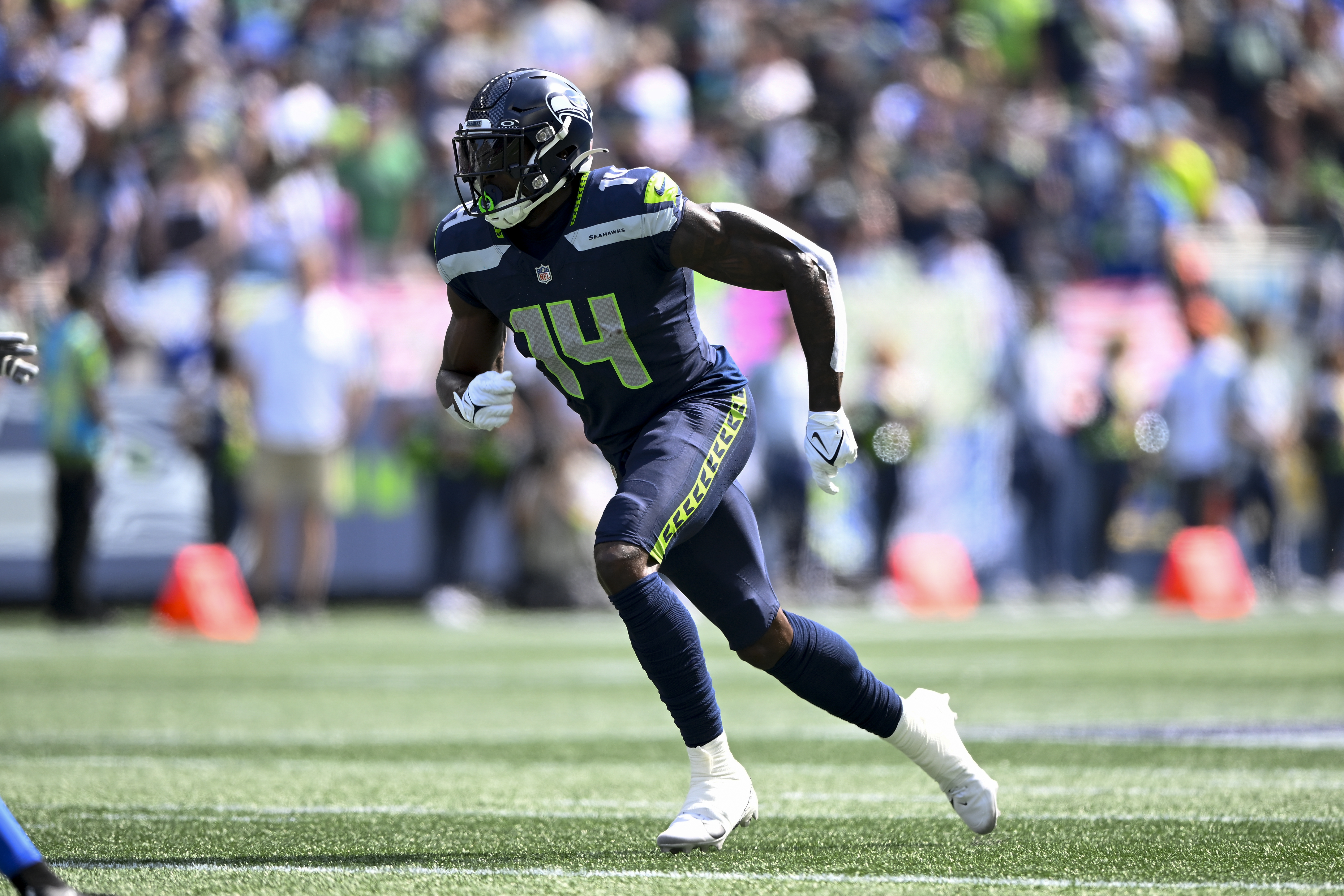 DK Metcalf #14 of the Seattle Seahawks in action during the game against the Los Angeles Rams at Lumen Field on September 10, 2023 in Seattle, Washington. The Los Angeles Rams won 30-13.