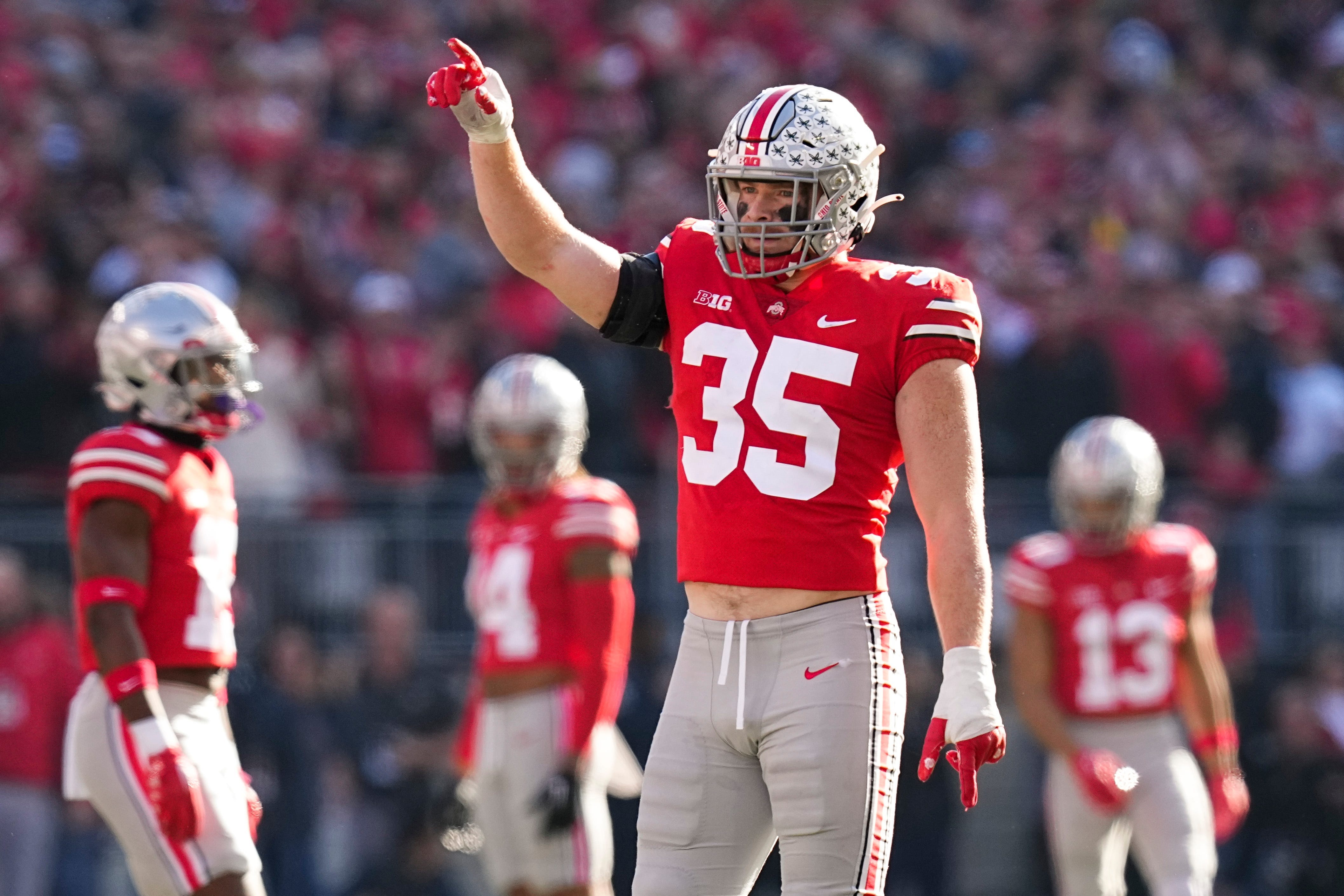 Ohio State Buckeyes linebacker Tommy Eichenberg celebrates a tackle during the first half of the NCAA football game against the Michigan Wolverines at Ohio Stadium.