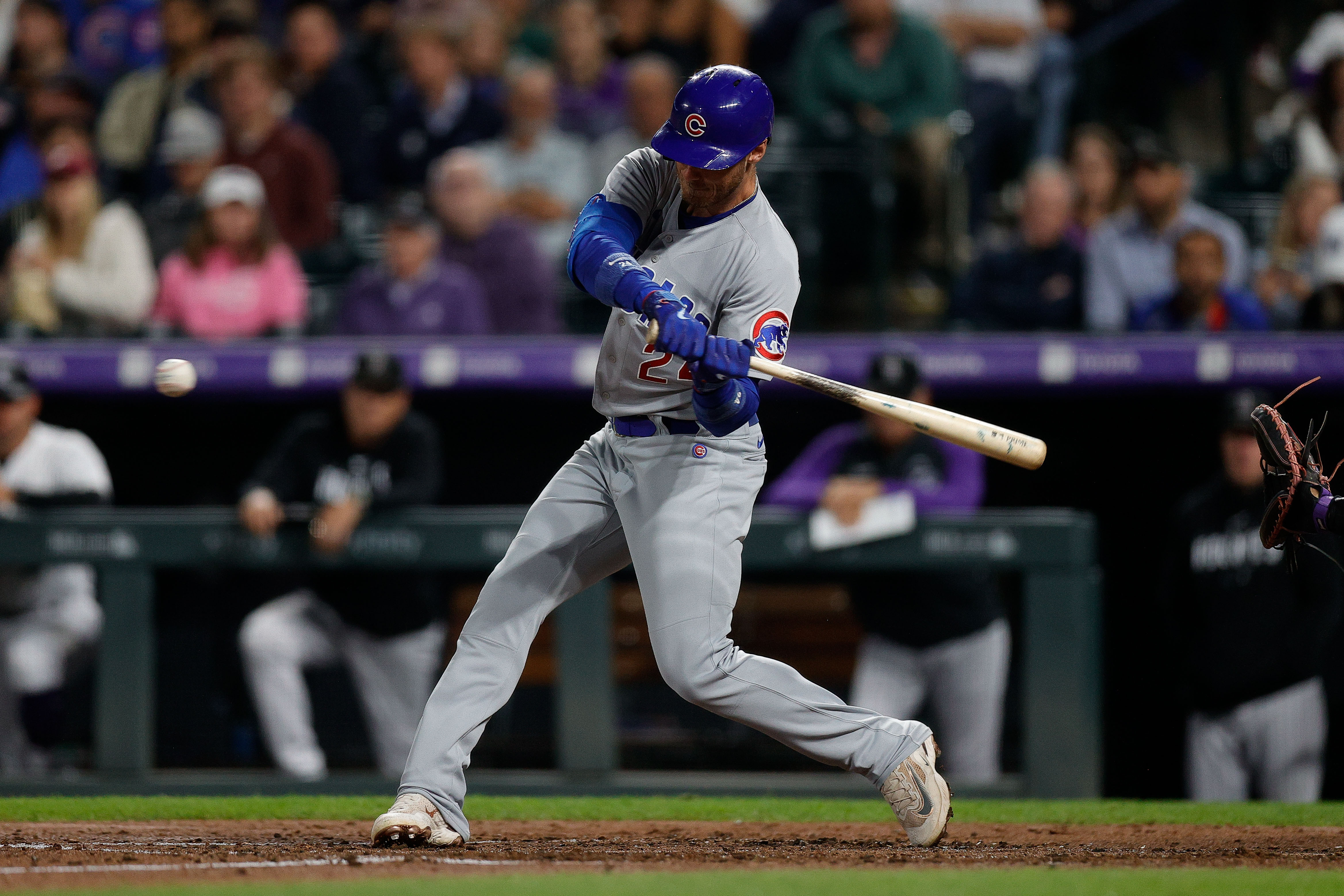 Chicago Cubs center fielder Cody Bellinger (24) hits a double in the sixth inning against the Colorado Rockies at Coors Field.&nbsp;