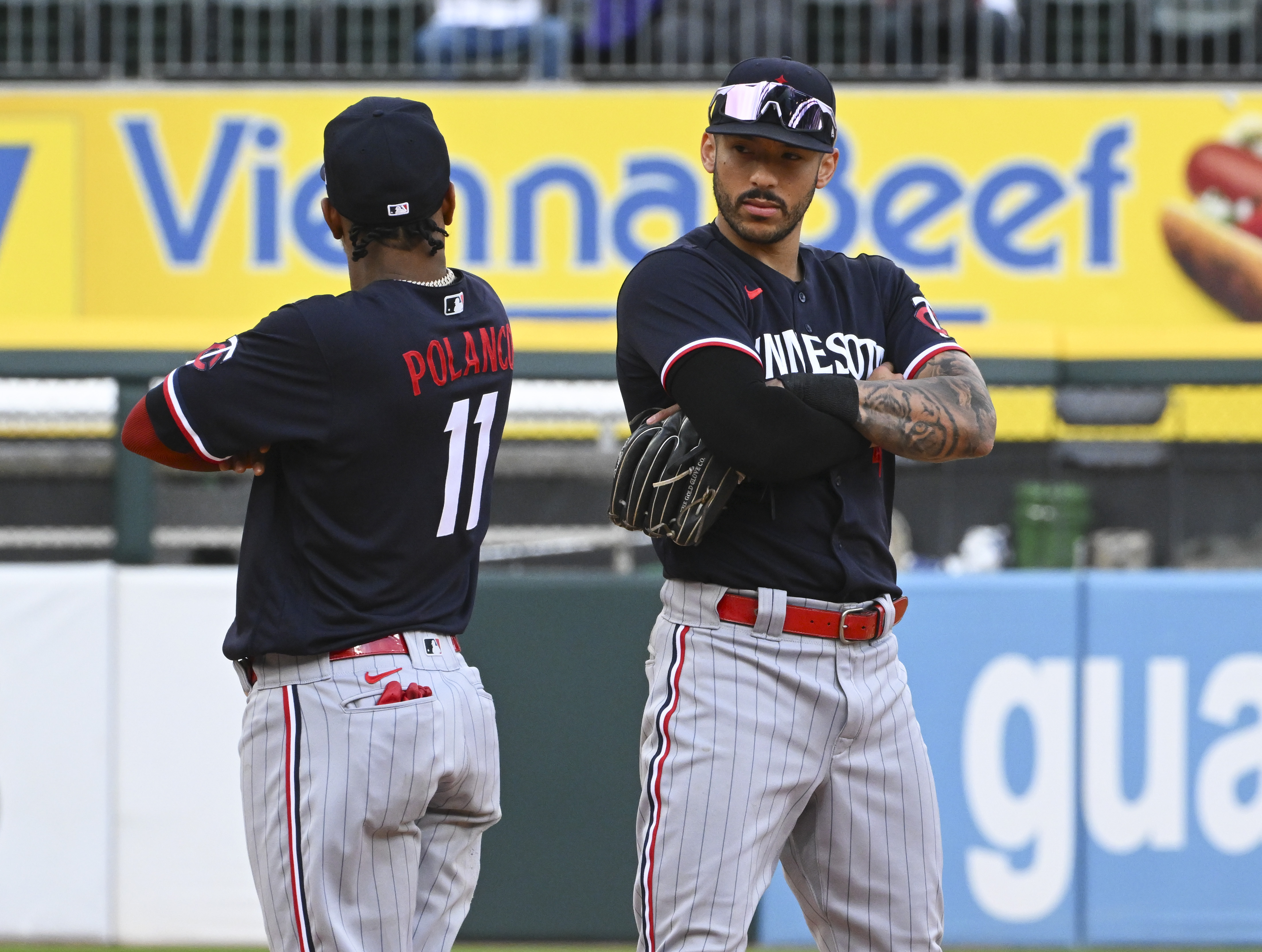 Jorge Polanco and Carlos Correa of the Minnesota Twins celebrate their team win over the Chicago White Sox at Guaranteed Rate Field on September 17, 2023 in Chicago, Illinois. The Twins defeated the White Sox 4-0.
