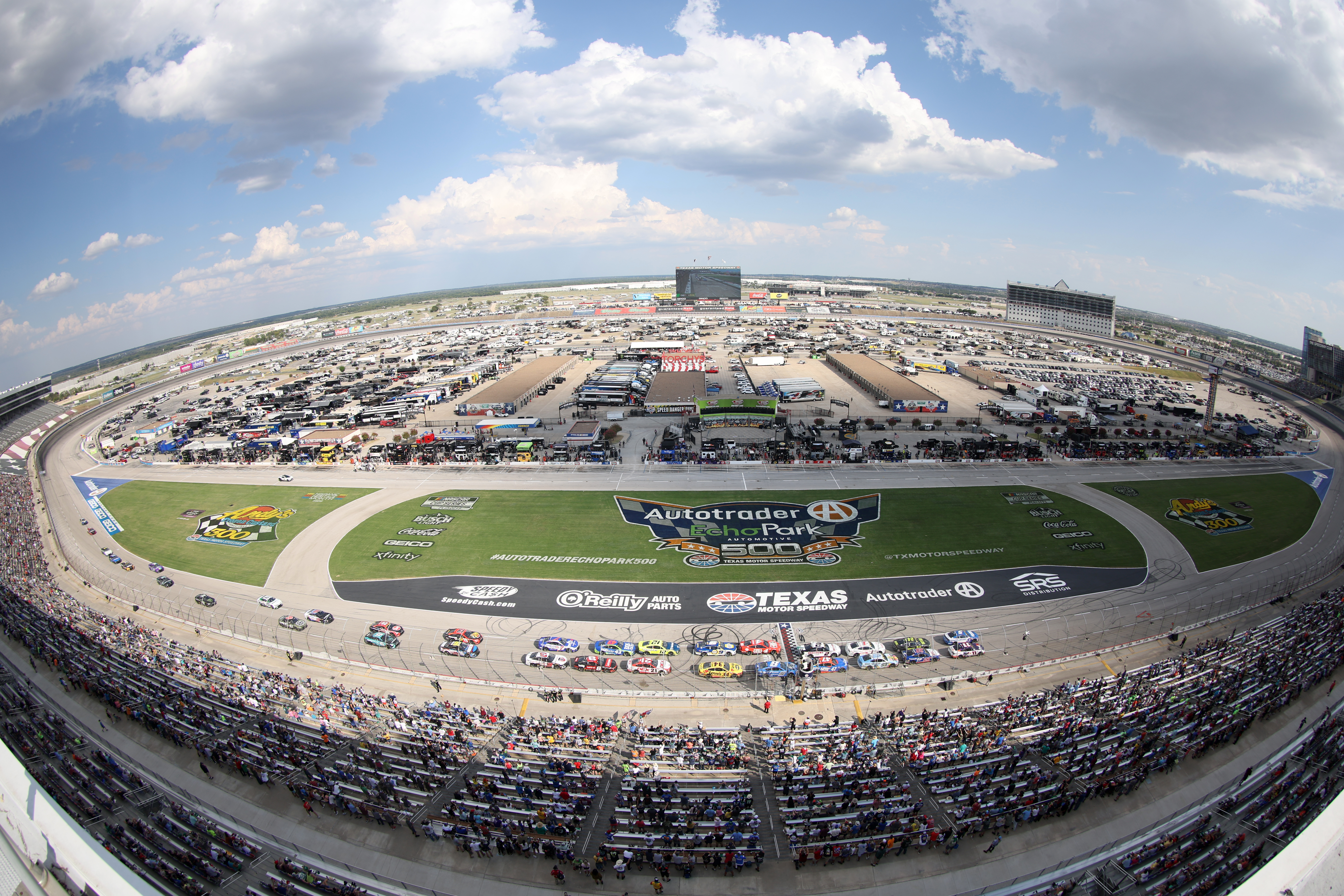 A general view of racing during the NASCAR Cup Series Auto Trader EchoPark Automotive 500 at Texas Motor Speedway on September 25, 2022 in Fort Worth, Texas.