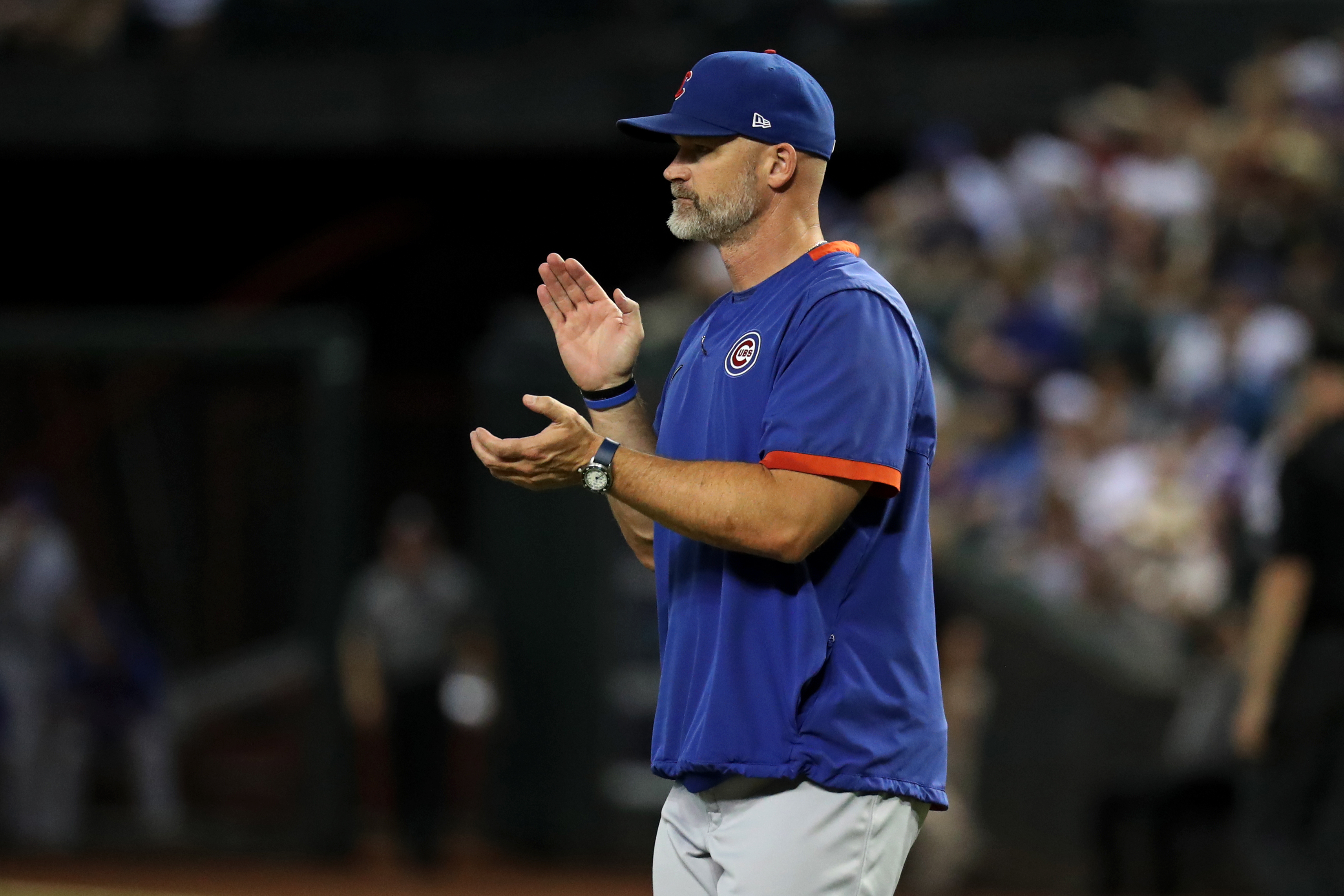 Chicago Cubs manager David Ross makes a pitching change during a baseball game between the Chicago Cubs and the Arizona Diamondbacks on September 17th, 2023, at Chase Field in Phoenix, AZ.
