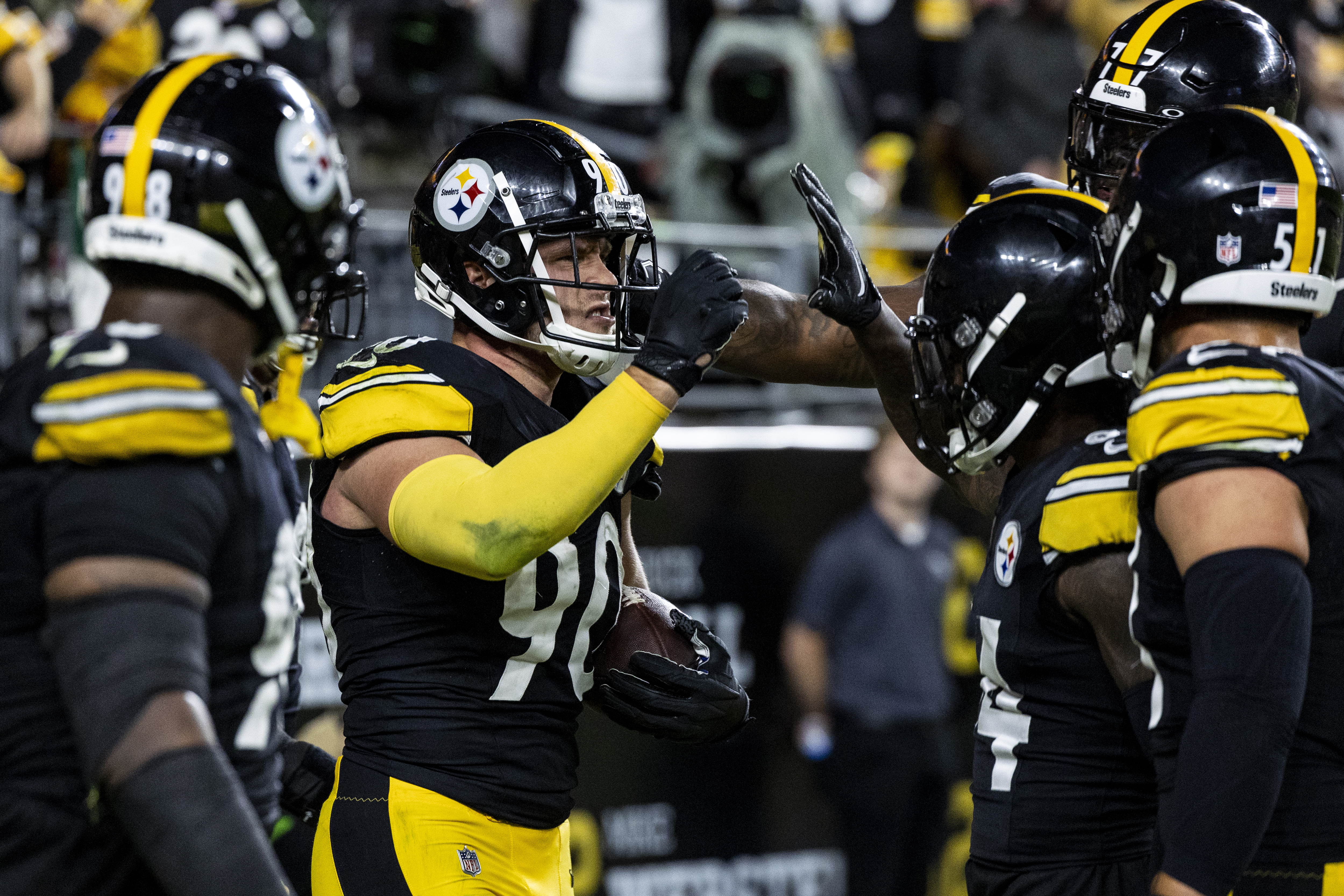 T.J. Watt #90 of the Pittsburgh Steelers celebrates with his teammates after scoring a touchdown in the fourth quarter of the game against the Cleveland Browns at Acrisure Stadium on September 18, 2023 in Pittsburgh, Pennsylvania. The Steelers beat the Browns 26-22.