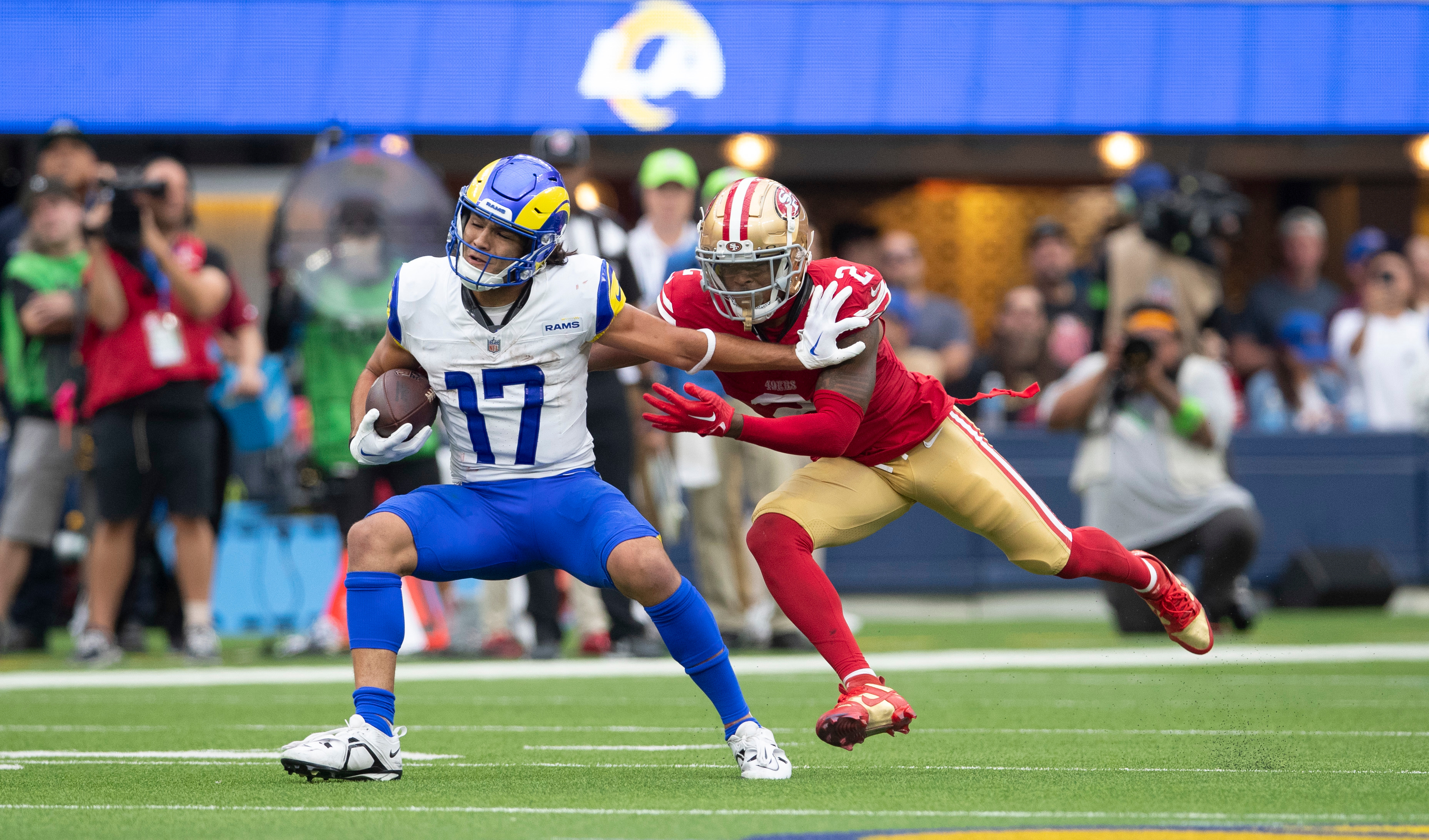 Puka Nacua #17 of the Los Angeles Rams runs after making a catch during the game against the San Francisco 49ers at SoFi Stadium on September 17, 2023 in Inglewood, California. The 49ers defeated the Rams 30-23.