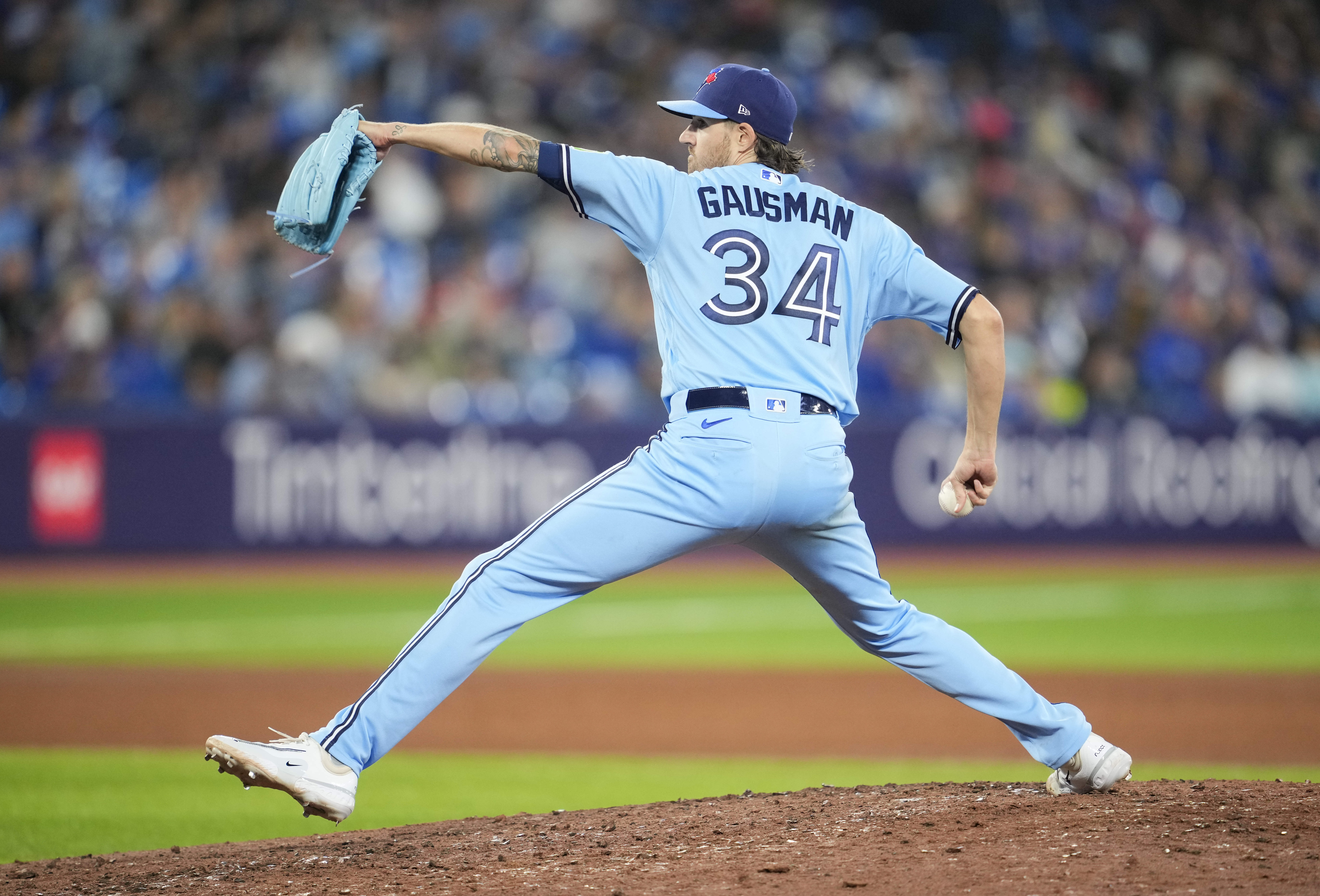 Kevin Gausman of Toronto Blue Jays pitches to the Texas Rangers during the fourth inning in their MLB game at the Rogers Centre on September 14, 2023 in Toronto, Ontario, Canada.
