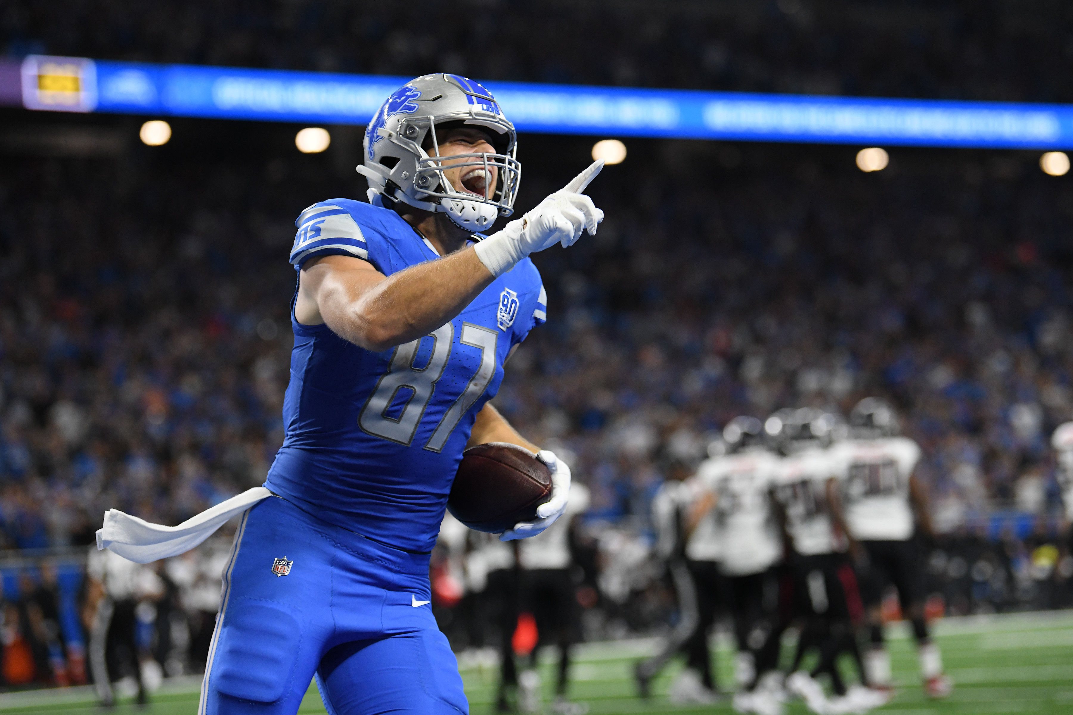 Detroit Lions tight end Sam LaPorta (87) celebrates after catching a touchdown pass against the Atlanta Falcons in the second quarter at Ford Field.&nbsp;