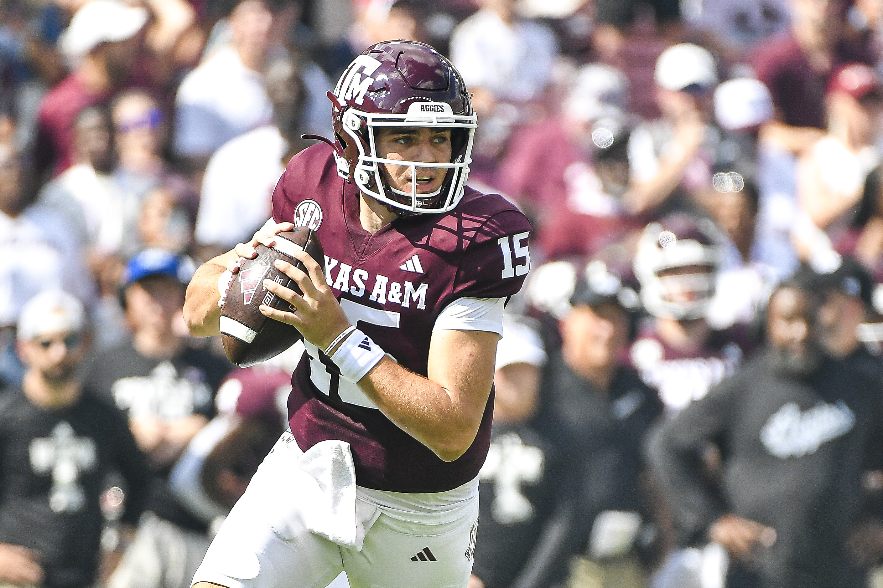 Quarterback Conner Weigman of the Texas A&amp;M Aggies looks to make a pass in the first half against the Auburn Tigers at Kyle Field on September 23, 2023 in College Station, Texas.
