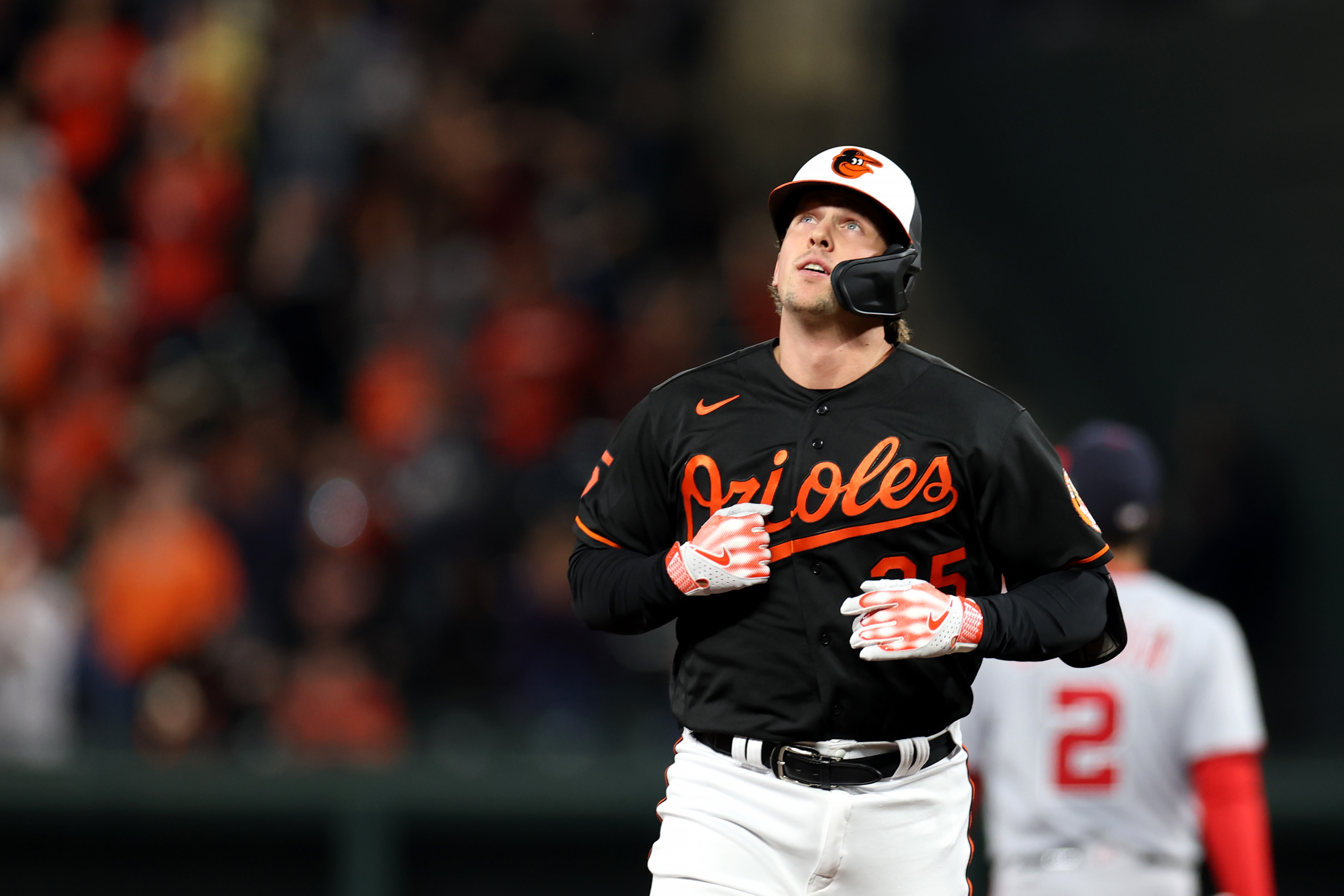 Adley Rutschman of the Baltimore Orioles celebrates while rounding the bases after hitting a two RBI home run against the Washington Nationals in the third inning at Oriole Park at Camden Yards on September 27, 2023 in Baltimore, Maryland.
