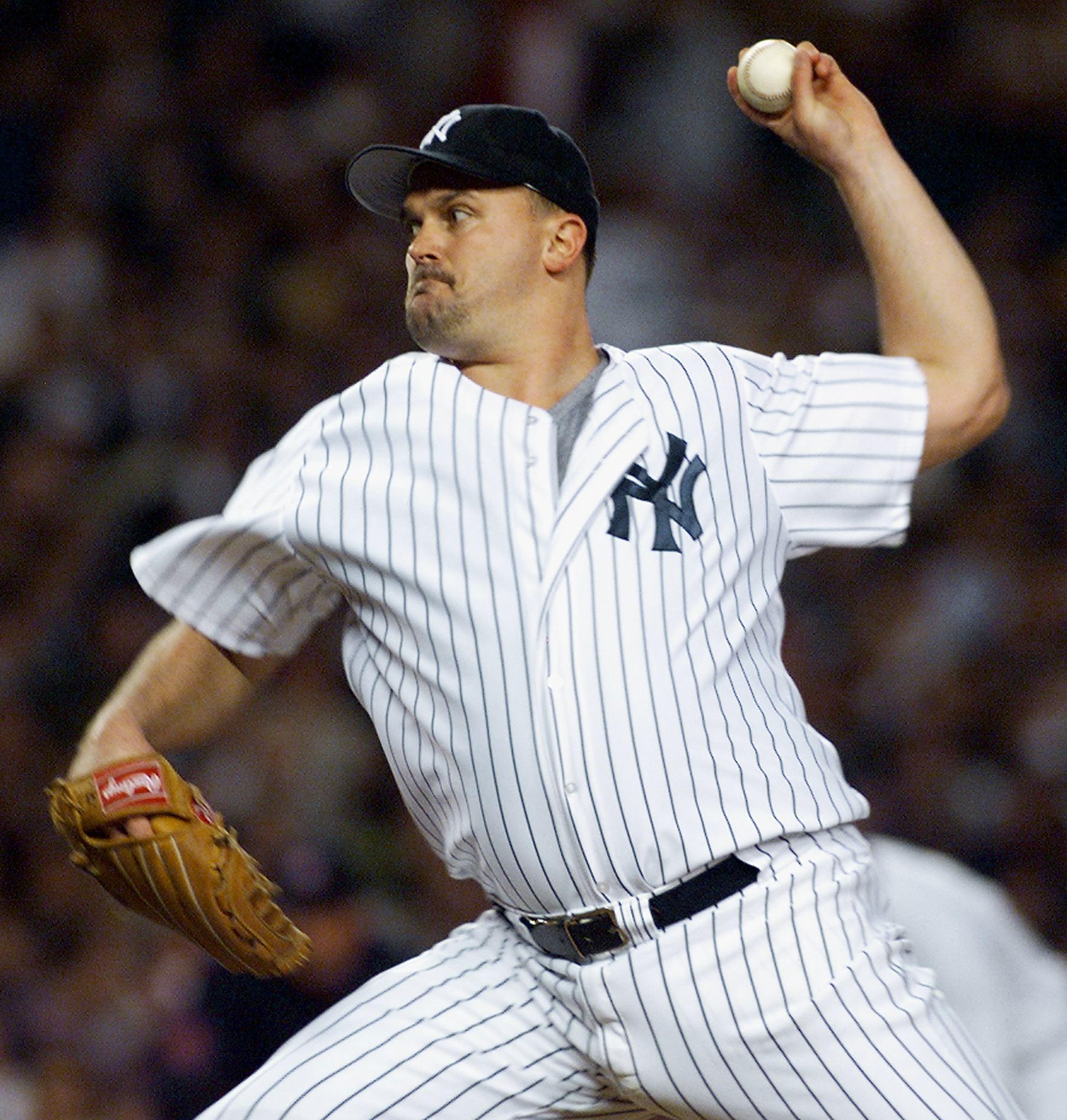 New York Yankees’ David Wells delivers a pitch in